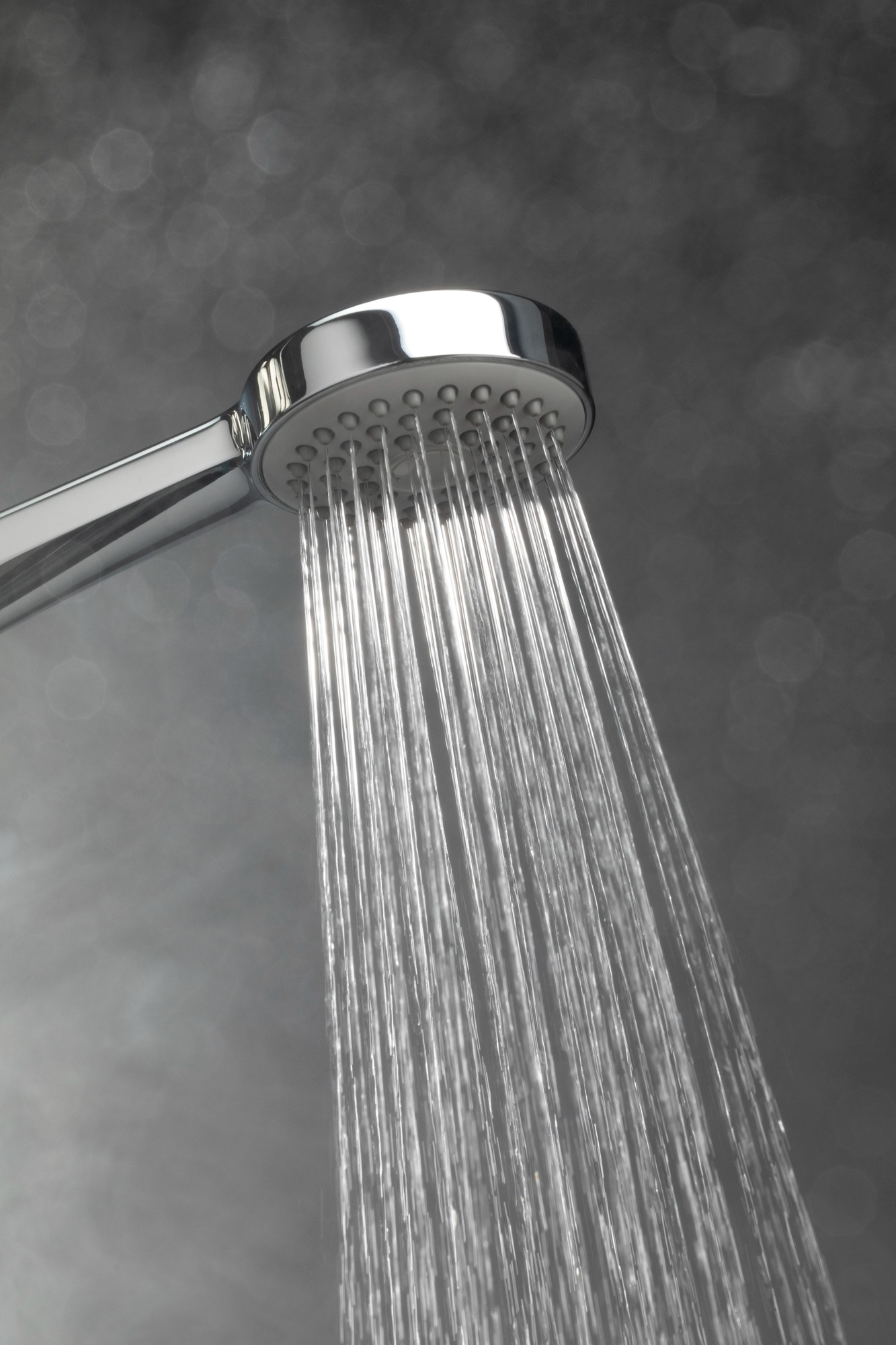 Water flowing through a shower head | Source: Freepik