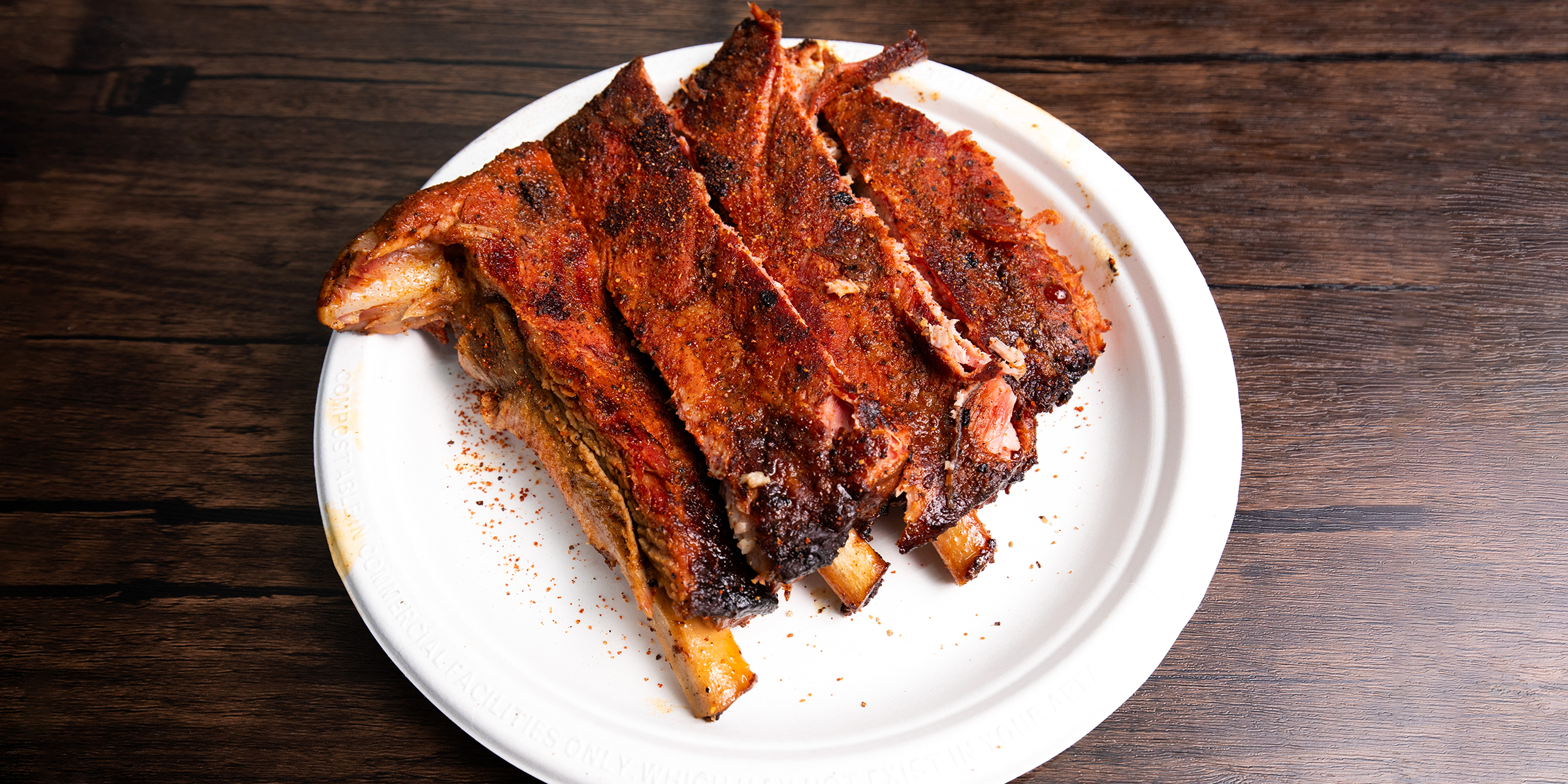 Barbecued ribs on a plate | Source: Shutterstock