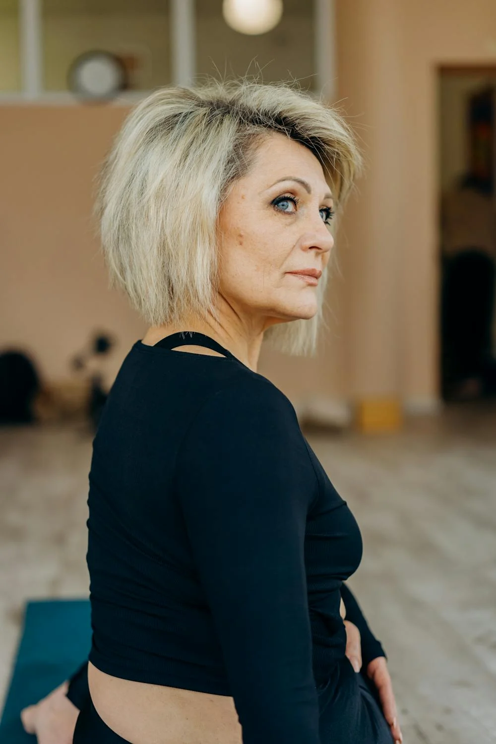 A mature woman in her workout clothes | Source: Pexels