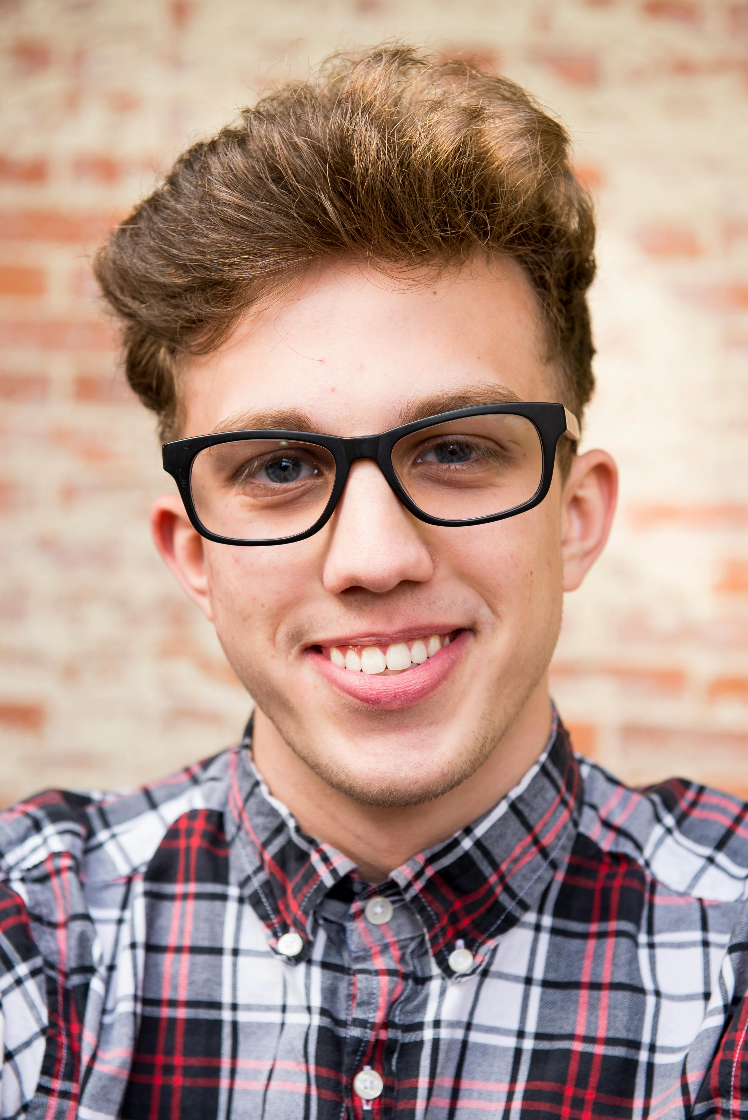 A smiling young man | Source: Pexels