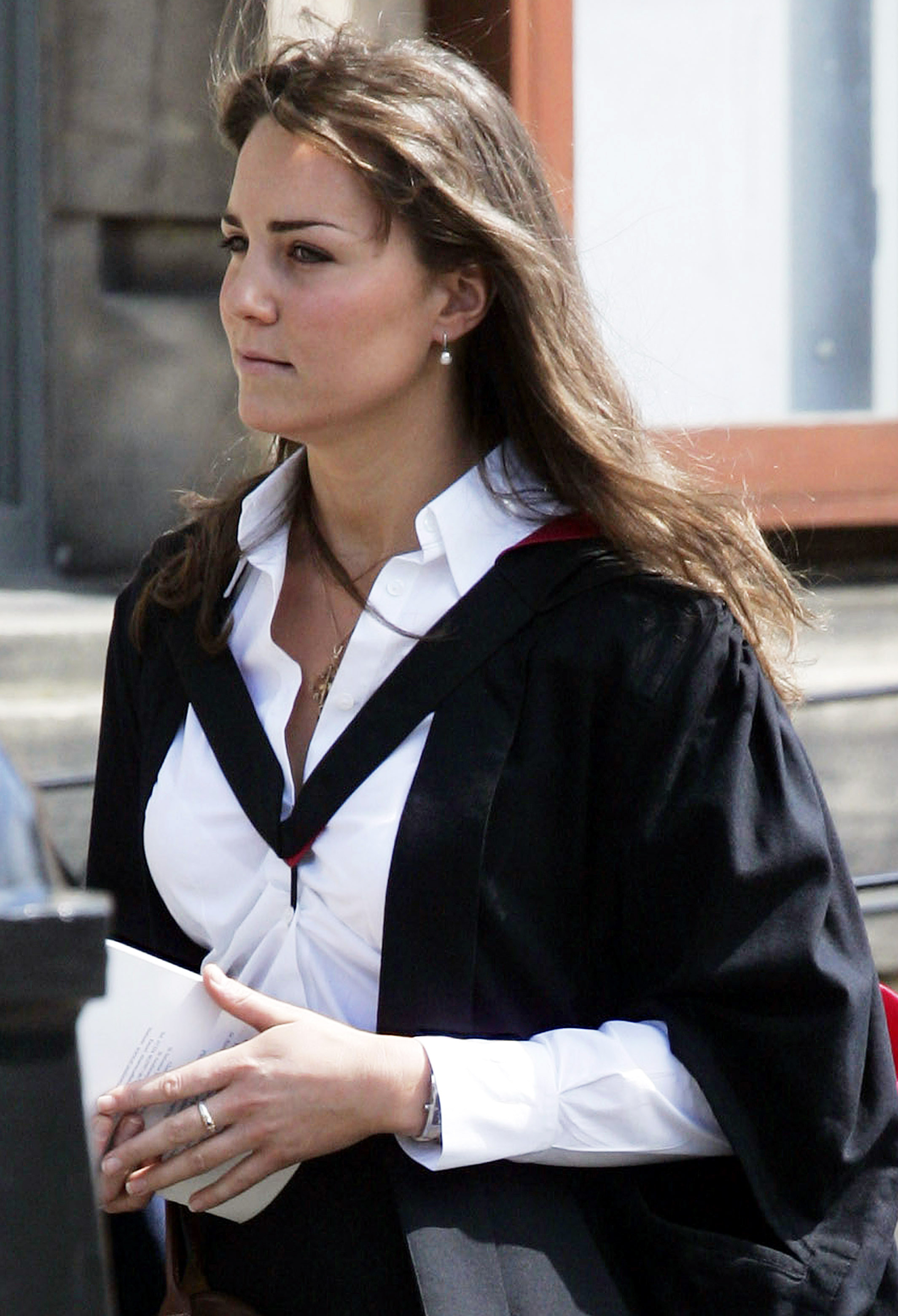 New graduate Kate Middleton wears a traditional gown to the graduation ceremony at St Andrew's University to collect her degree in St Andrew's on June 23, 2005, England. | Source: Getty Images