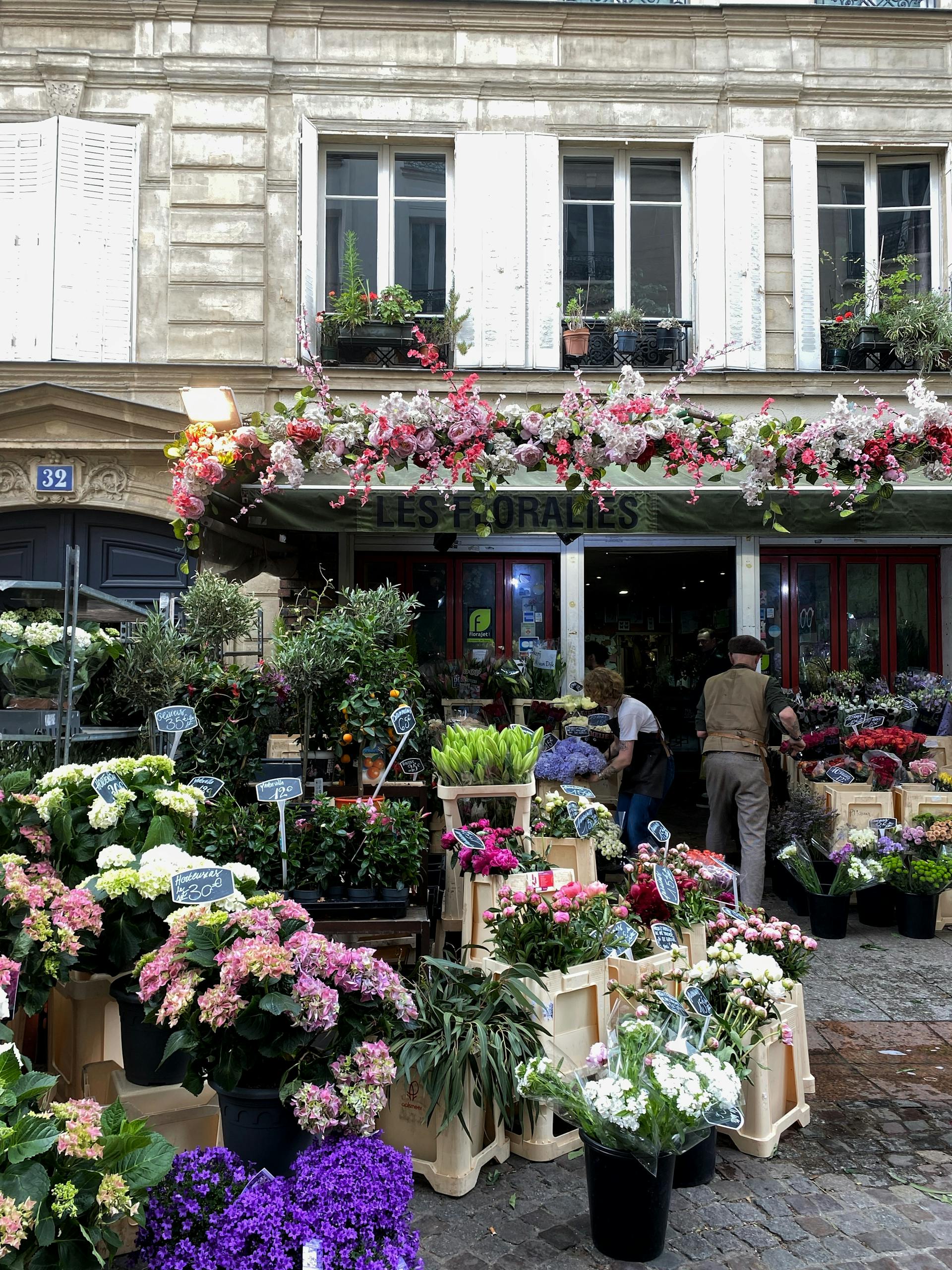 People working in a flower shop | Source: Pexels