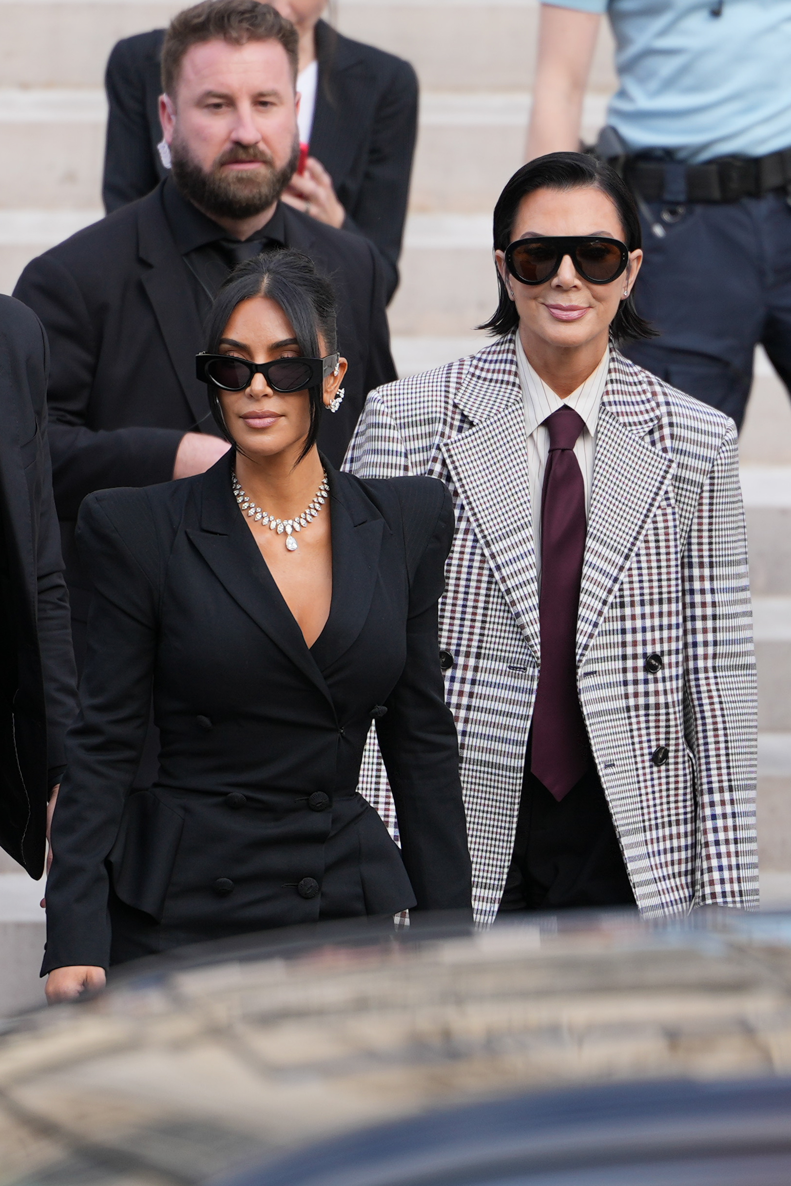 Kim Kardashian and Kris Jenner exit the trial at the Palais de Justice on May 13, 2025, in Paris, France. | Source: Getty Images