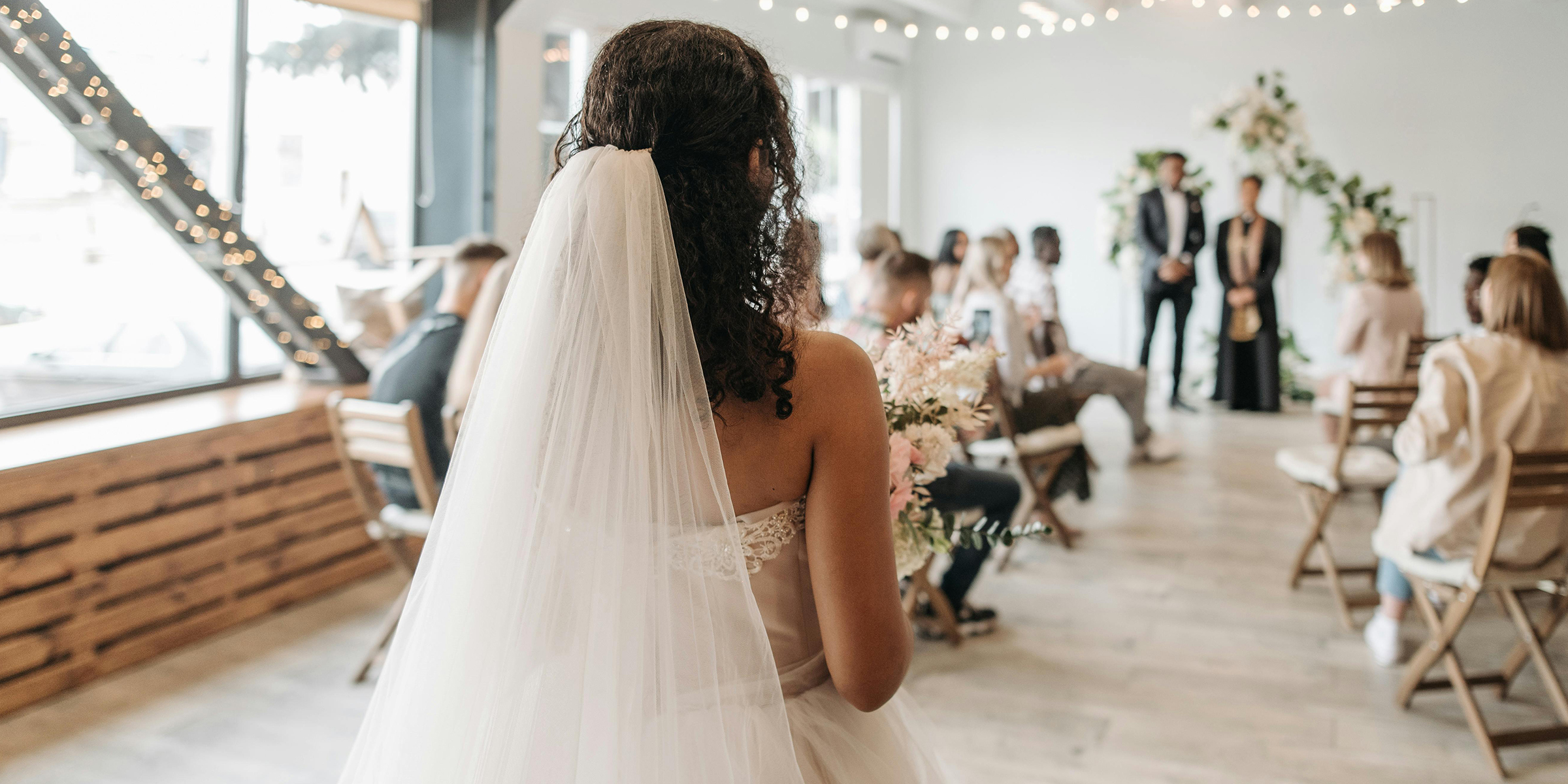 A bride walking down an aisle | Source: Pexels