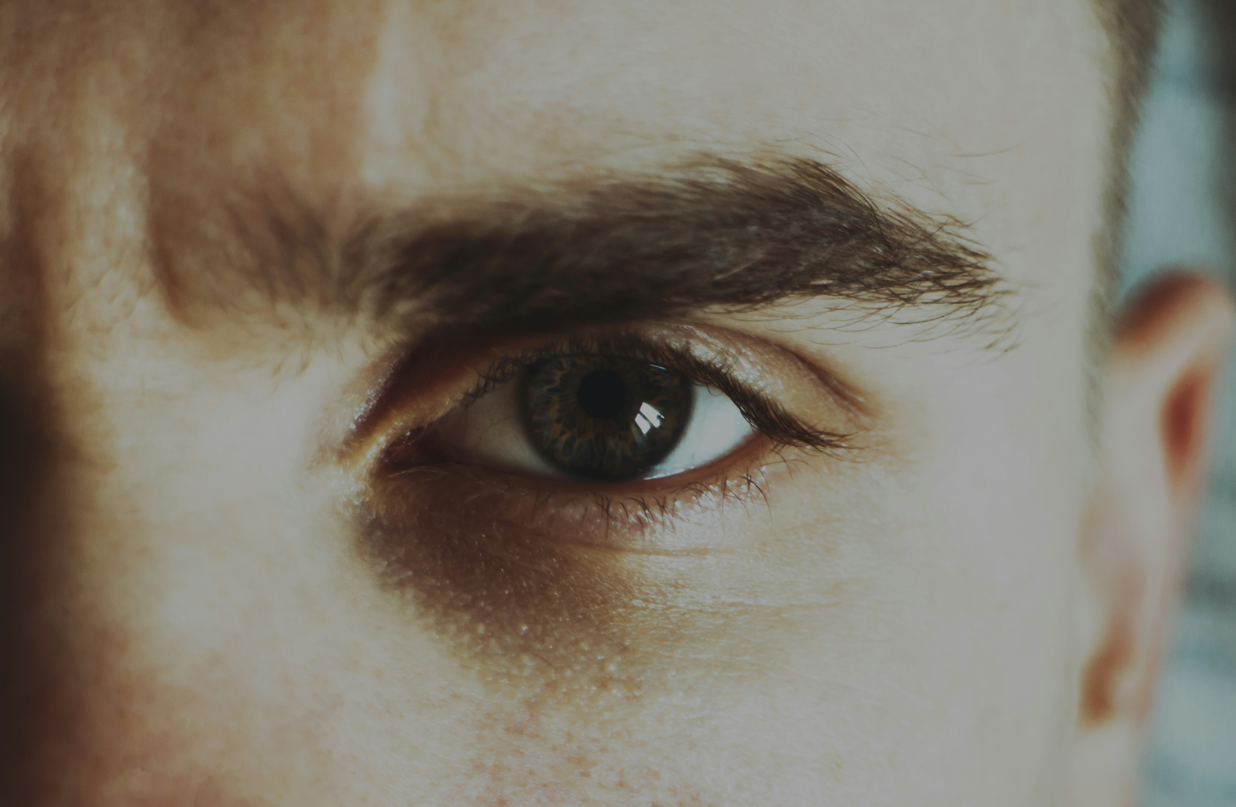 Close-up of an angry man's eye | Source: Unsplash