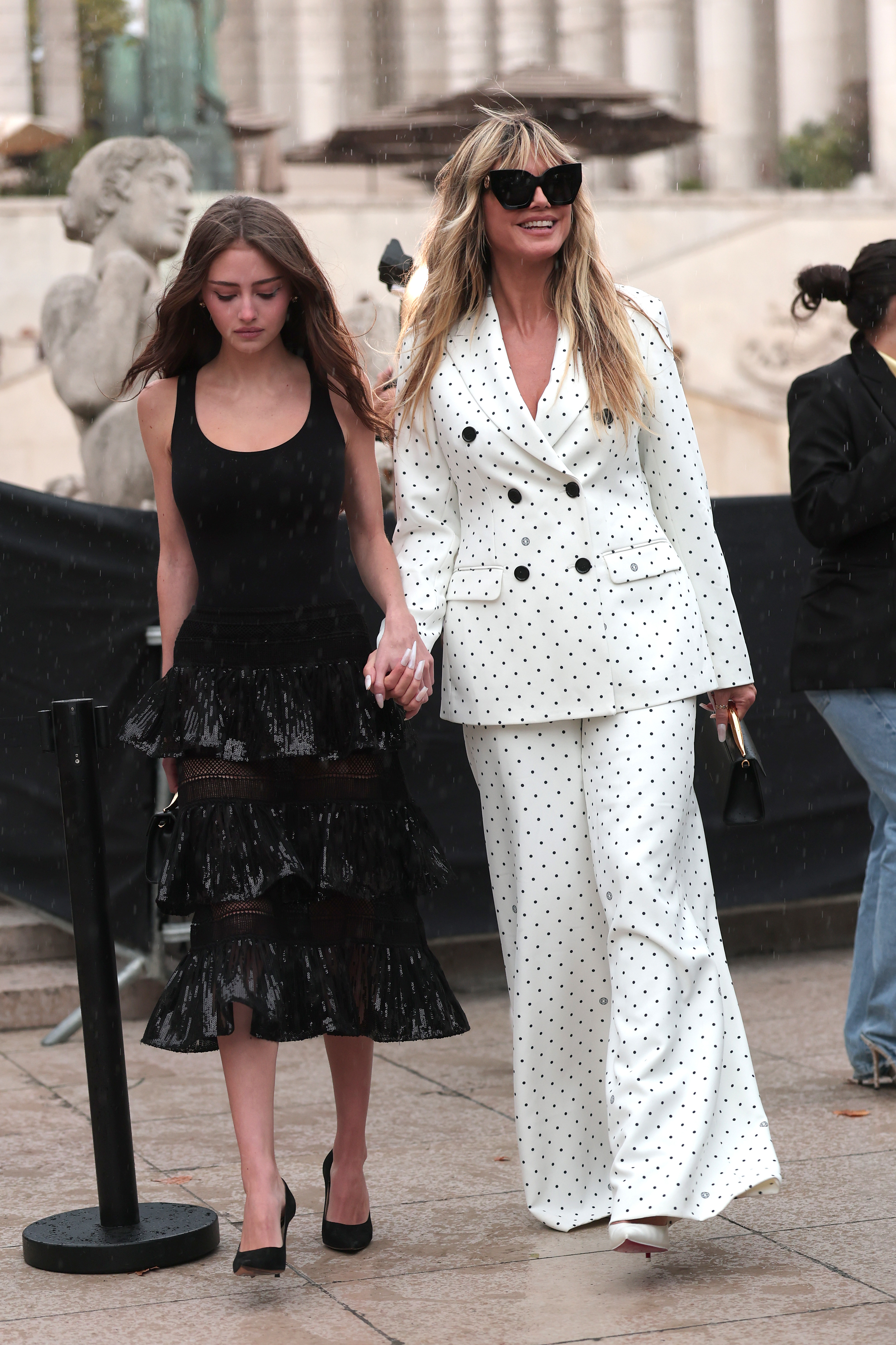 Leni Klum and Heidi Klum attend the Elie Saab Womenswear Spring/Summer 2026 show as part of Paris Fashion Week on October 04, 2025 in Paris, France. | Source: Getty Images