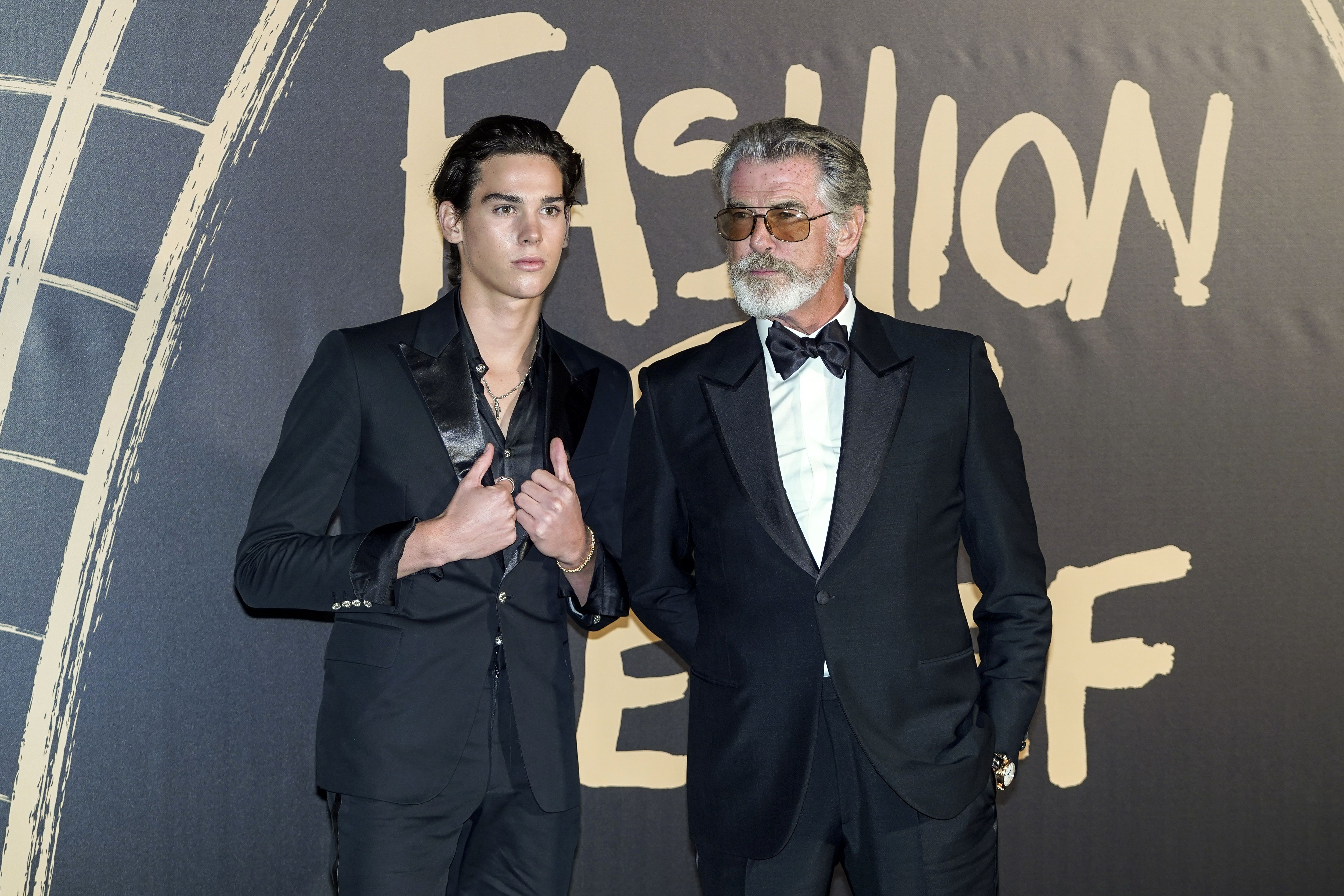 Pierce Brosnan and his son, Paris, at the Fashion For Relief charity gala event on the second day of London Fashion Week in England on September 14, 2019. | Source: Getty Images