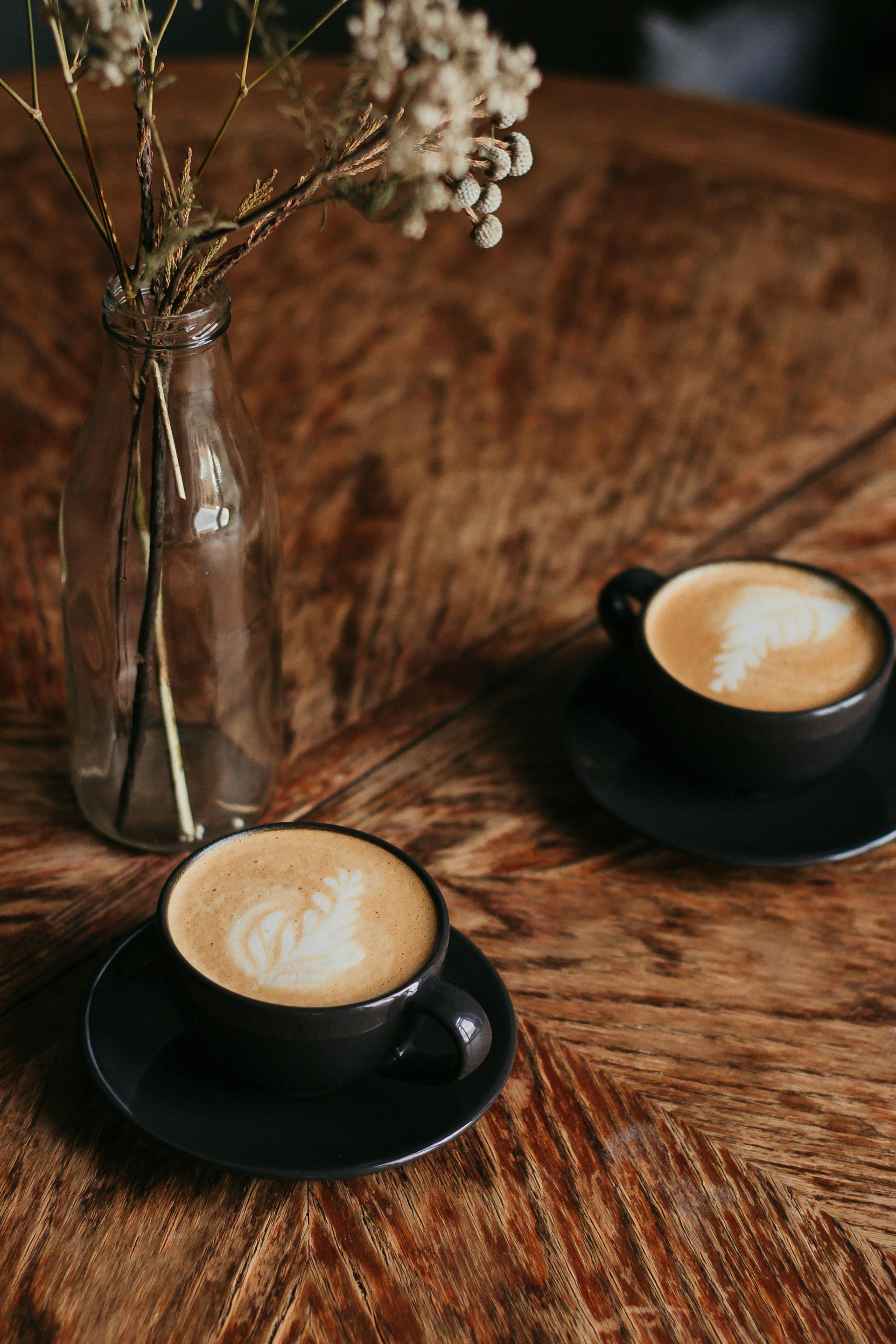 Two cups of coffee on a table | Source: Pexels