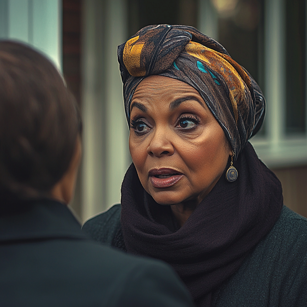 A woman talking to her neighbor | Source: Midjourney