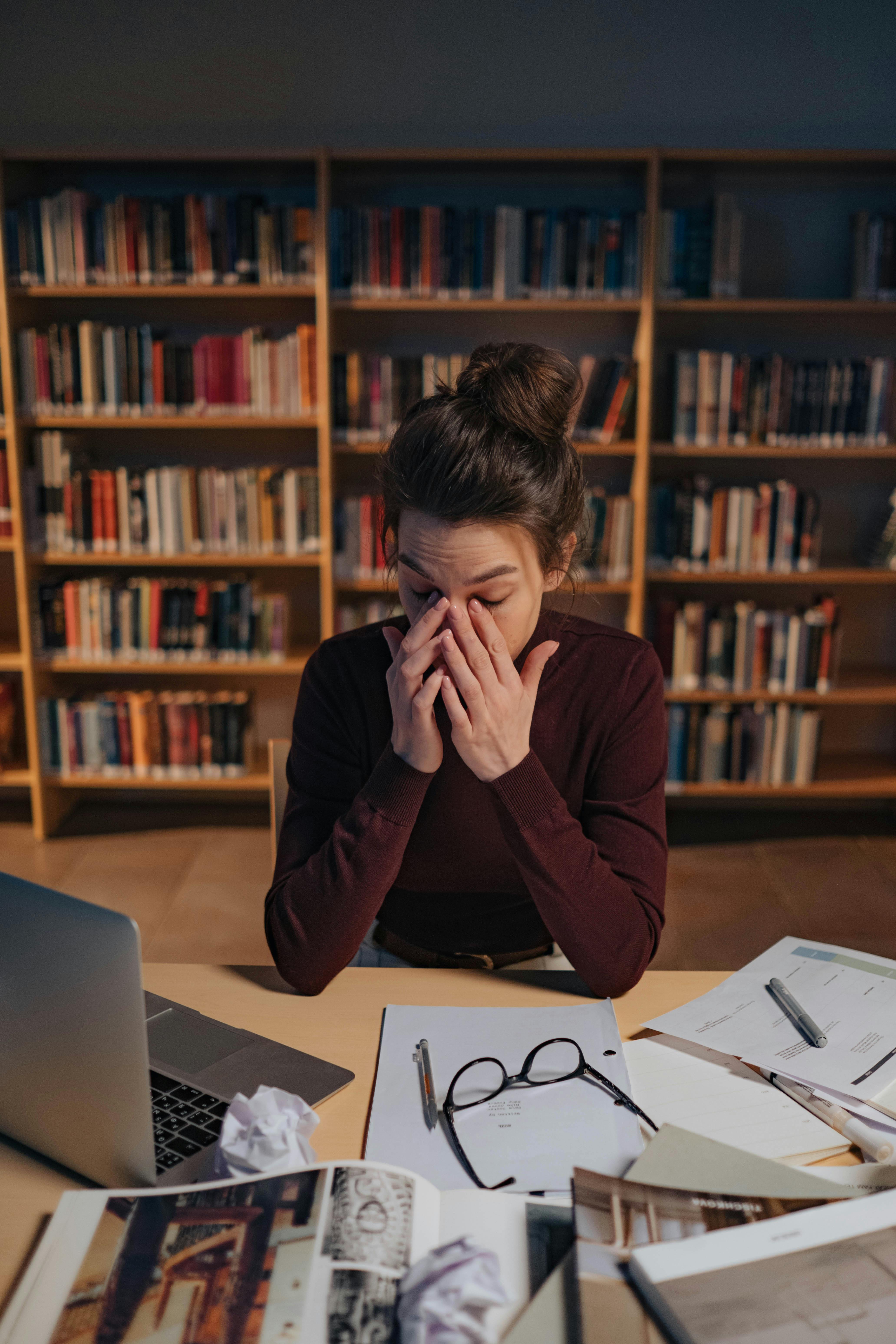 A woman working at a library | Source: Pexels