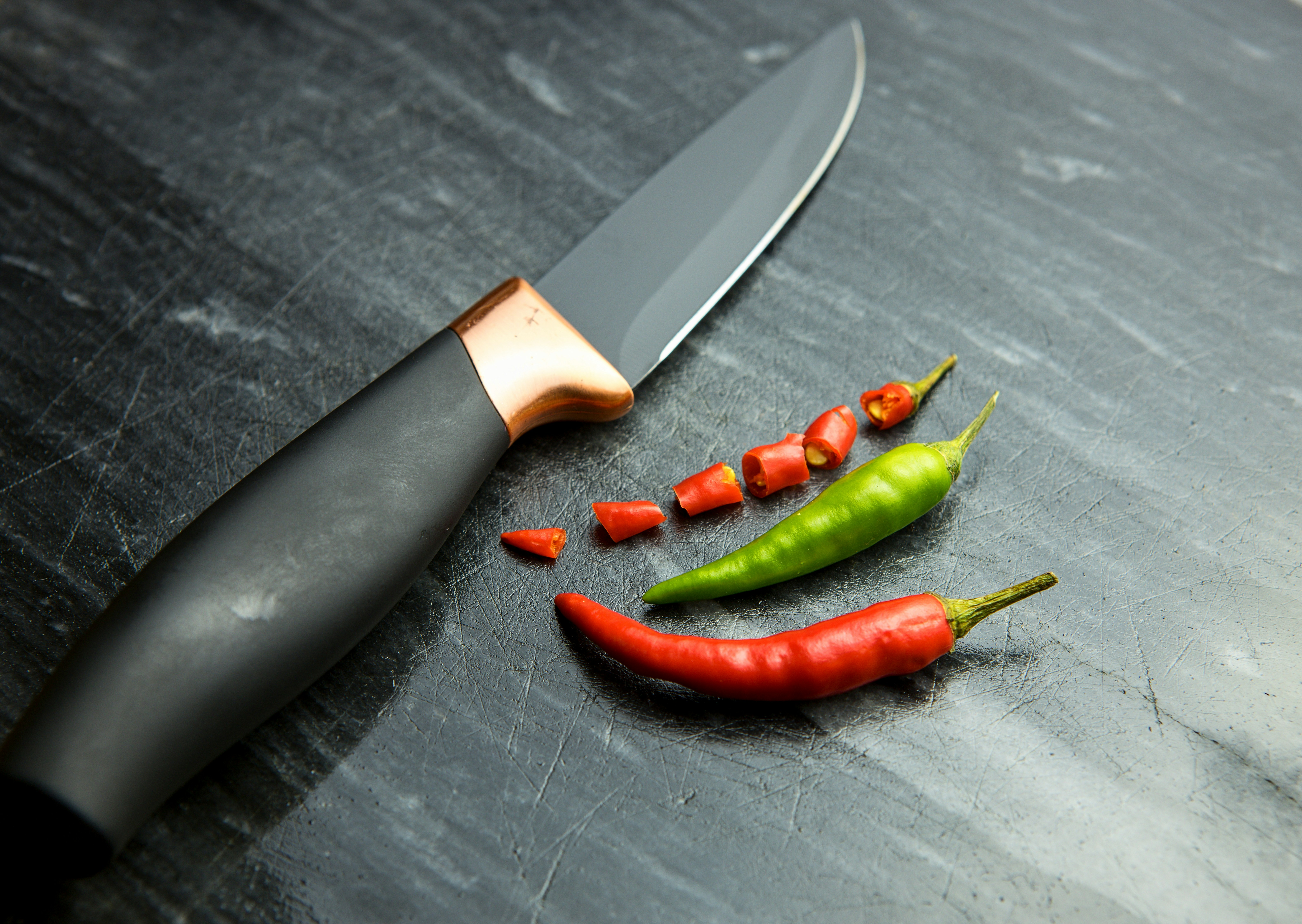 Chilies on a counter | Source: Unsplash