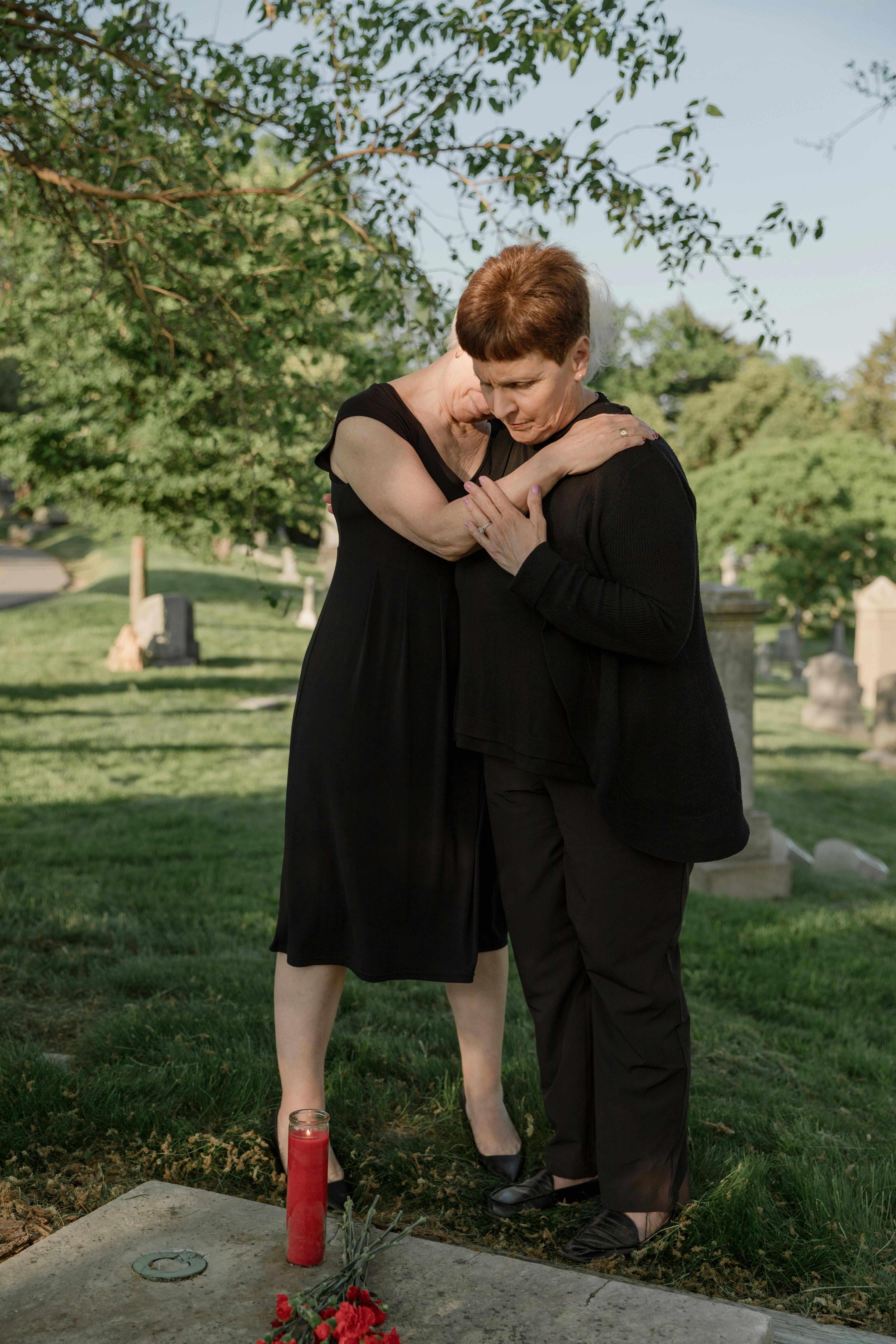 Two grieving women hugging | Source: Pexels