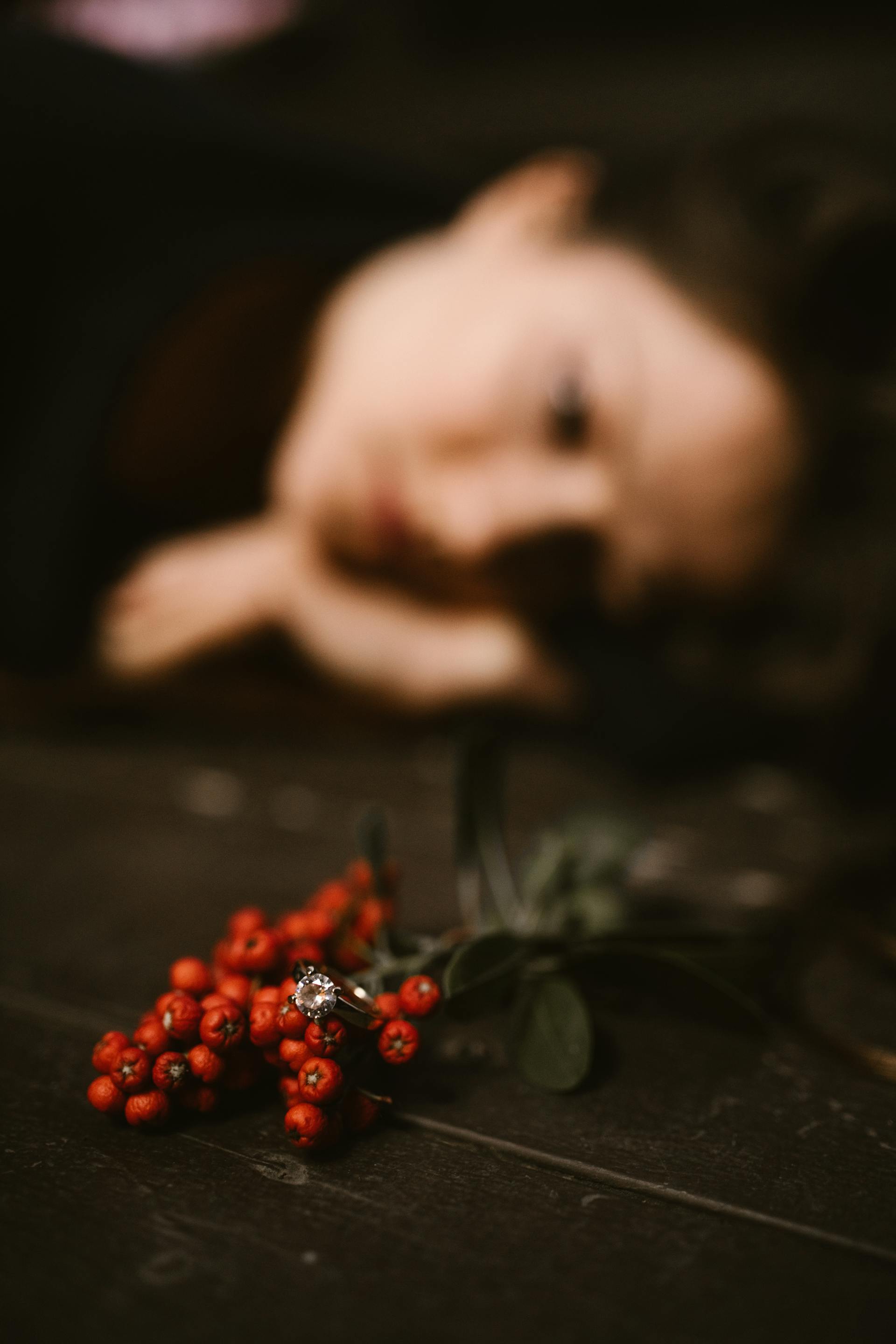 My Stepfather Told My Mom She Didn't Need Pretty Clothes Anymore – It Was His Biggest Mistake 6 A blurry photo of a sad woman looking at her wedding ring | Source: Pexels