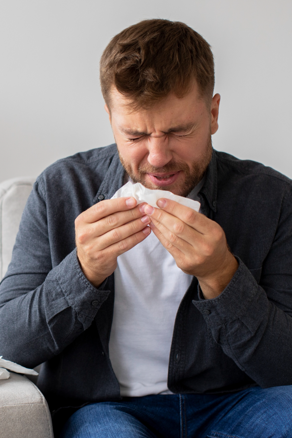 A man with allergies | Source: Freepik