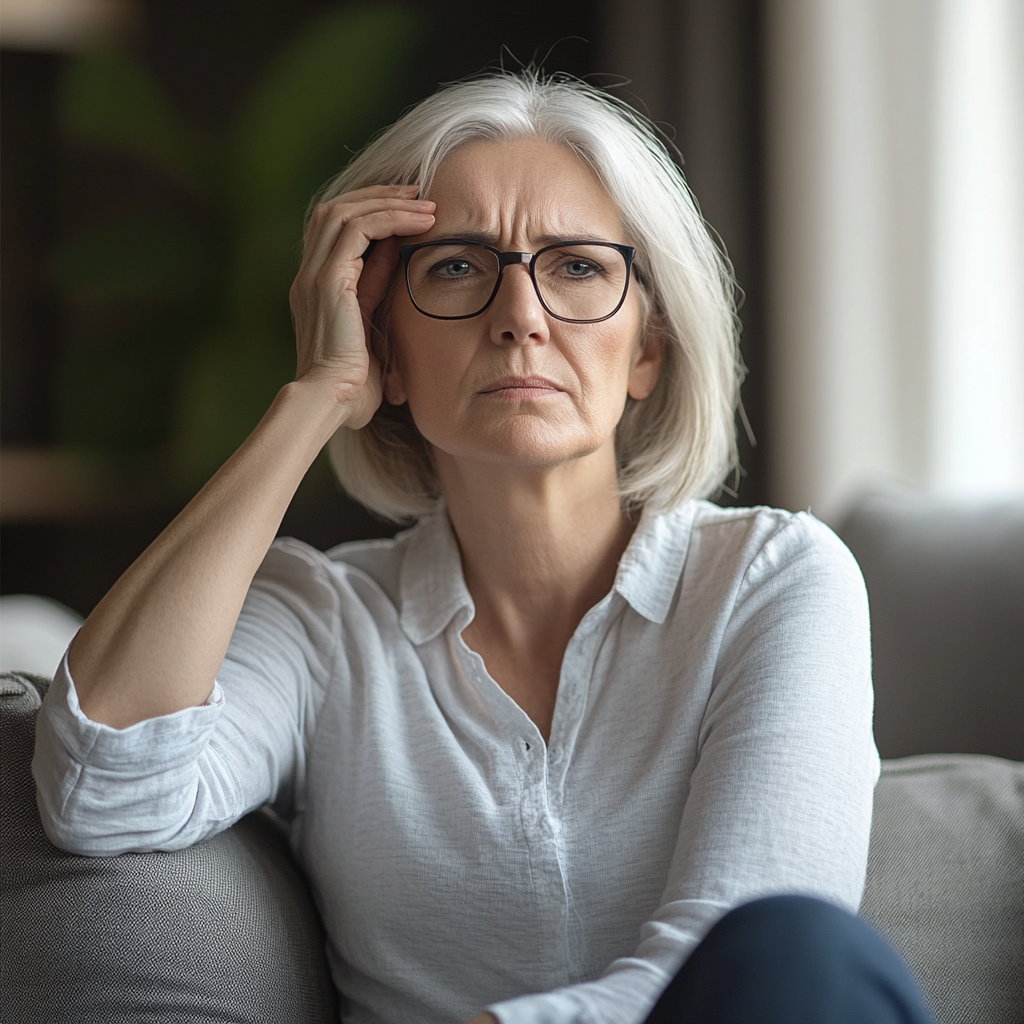 A frowning older woman | Source: Midjourney