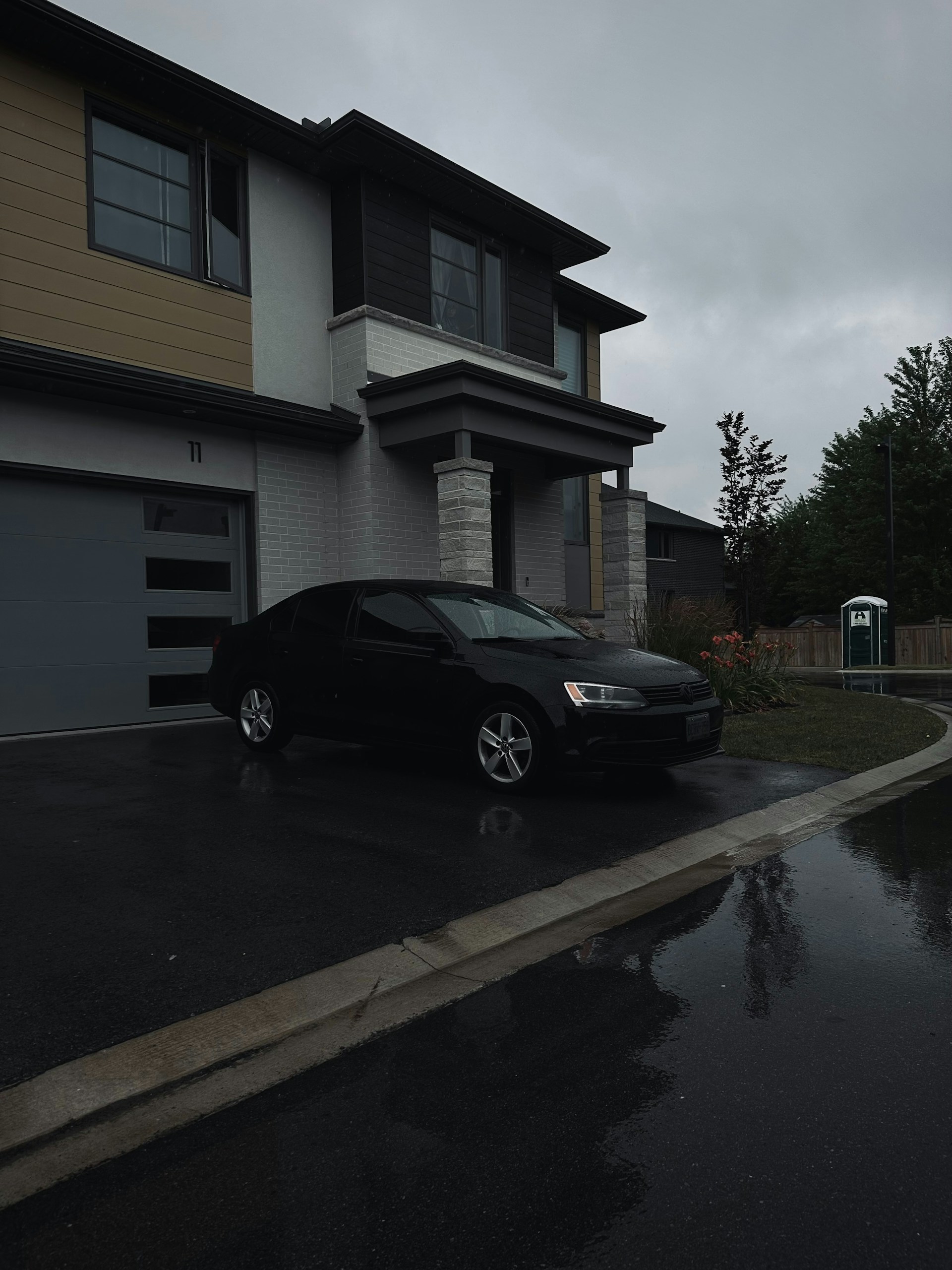 A car parked outside a house | Source: Unsplash