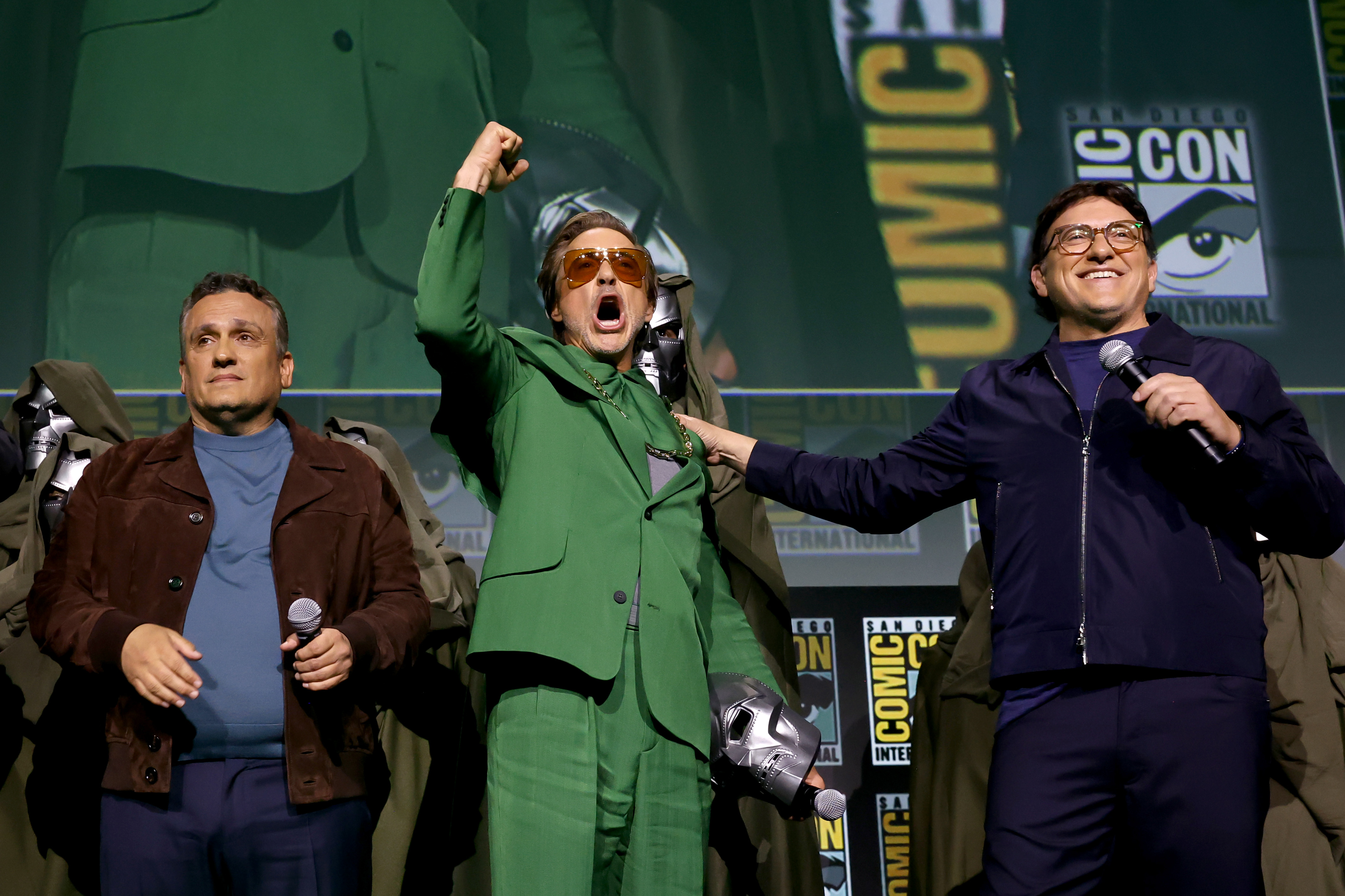 Joe Russo, Robert Downey Jr. and Anthony Russo speak onstage during the Marvel Studios Panel in Hall H at SDCC in San Diego, California on July 27, 2024. | Source: Getty Images