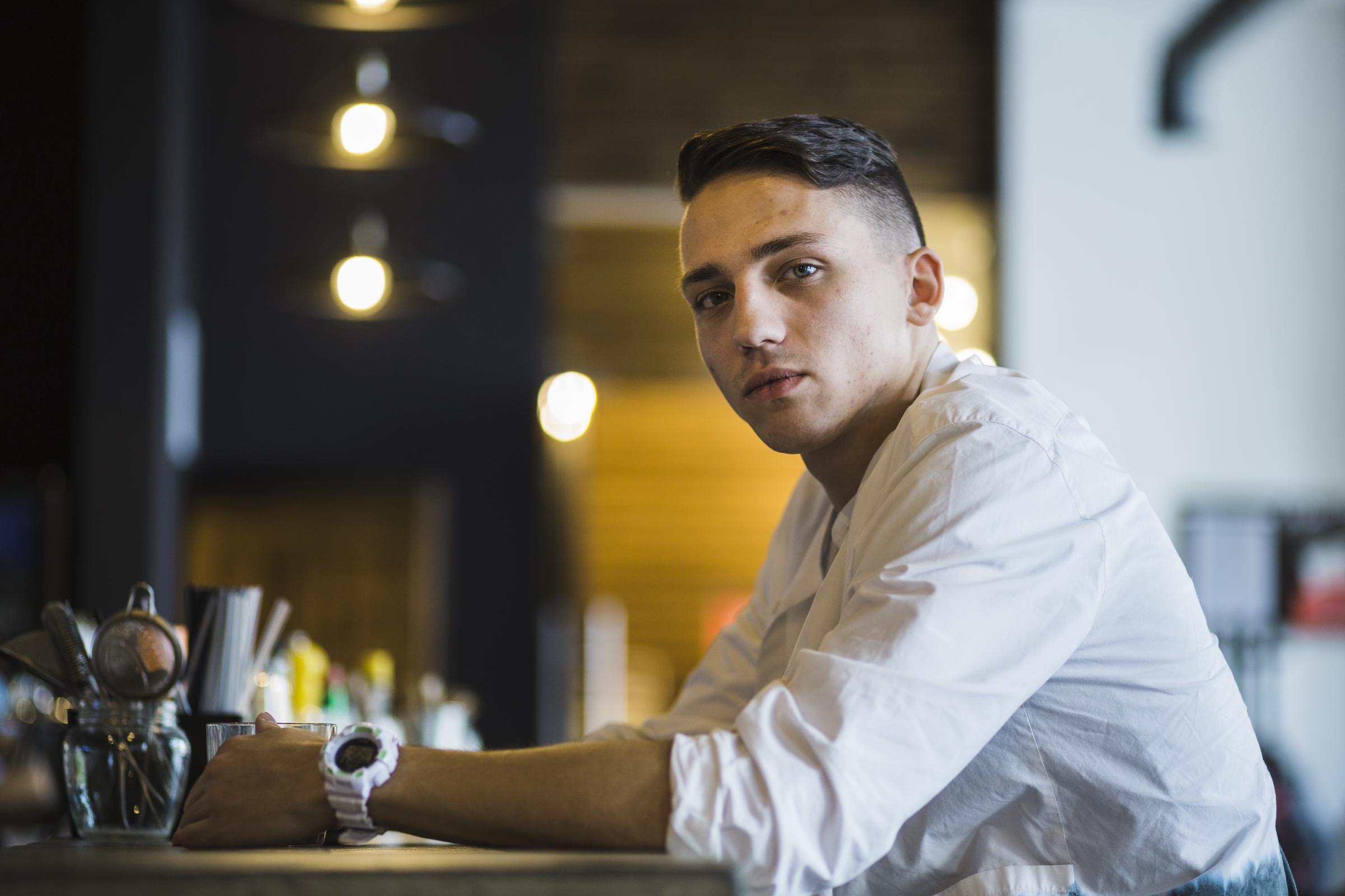 A man at a restaurant | Source: Freepik