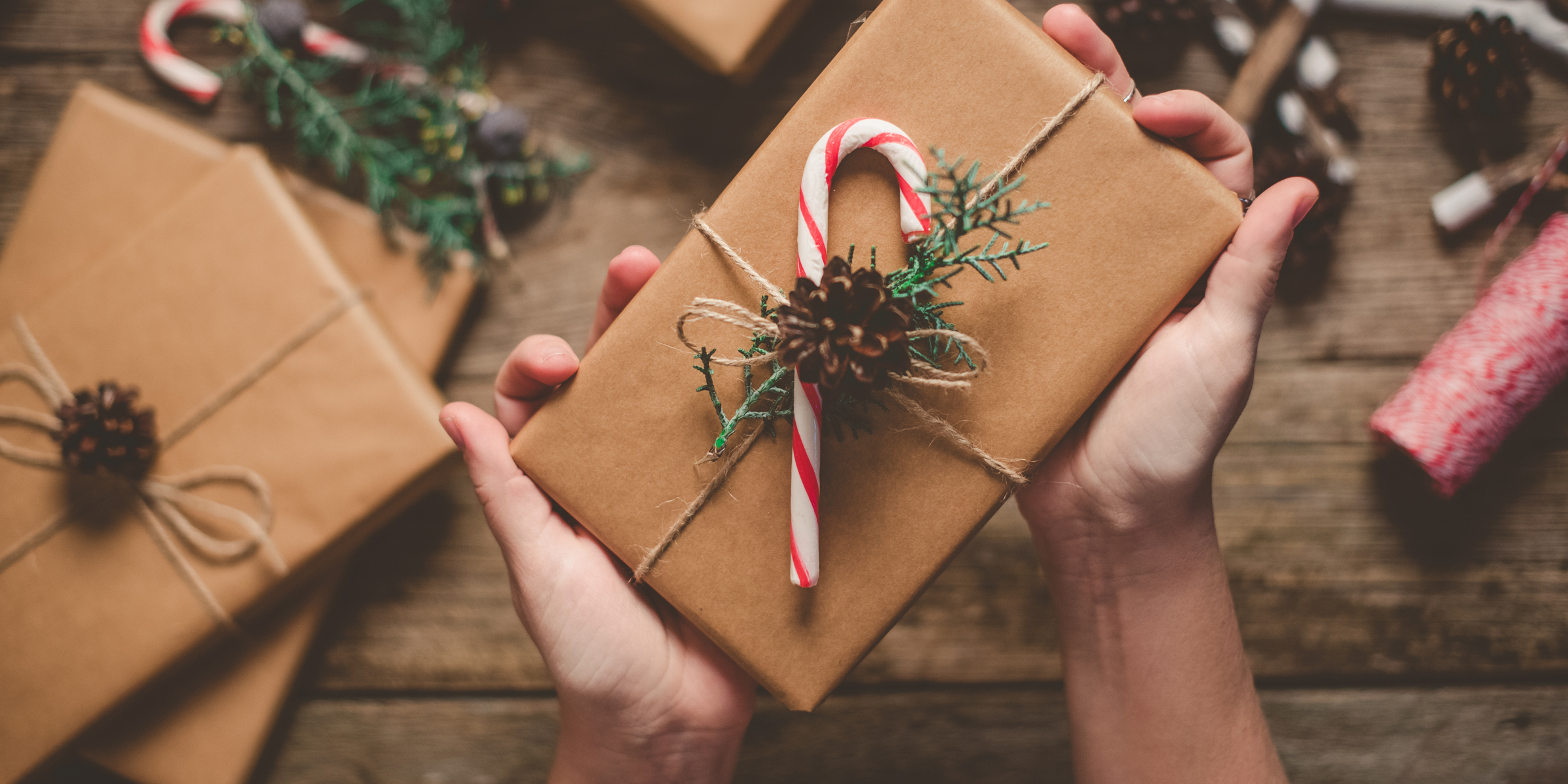 A person holding a Christmas present | Source: Getty Images