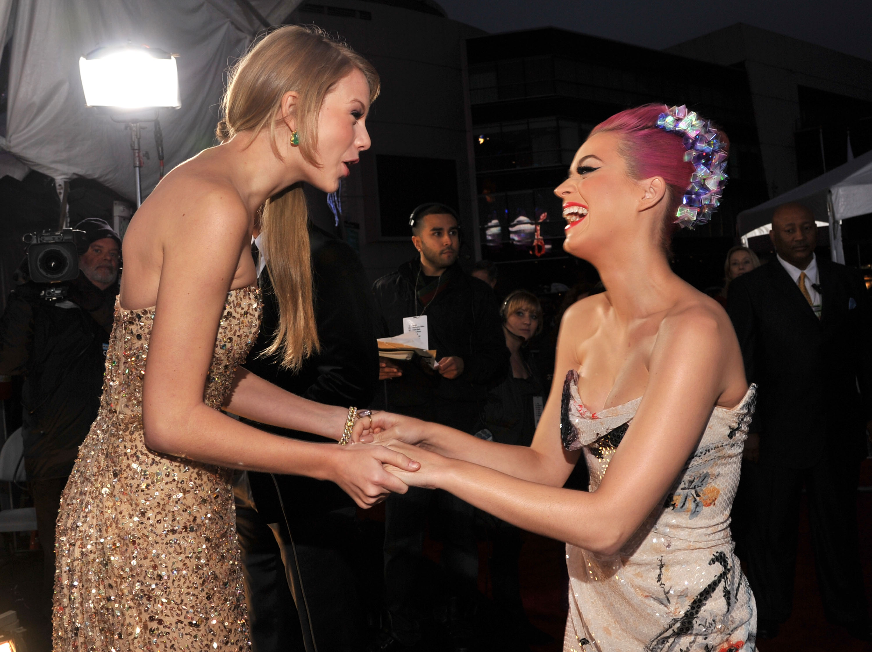 Taylor Swift (L) and Katy Perry arrive at the 2011 American Music Awards held at Nokia Theatre L.A. LIVE on November 20, 2011 in Los Angeles, California. | Source: Getty Images