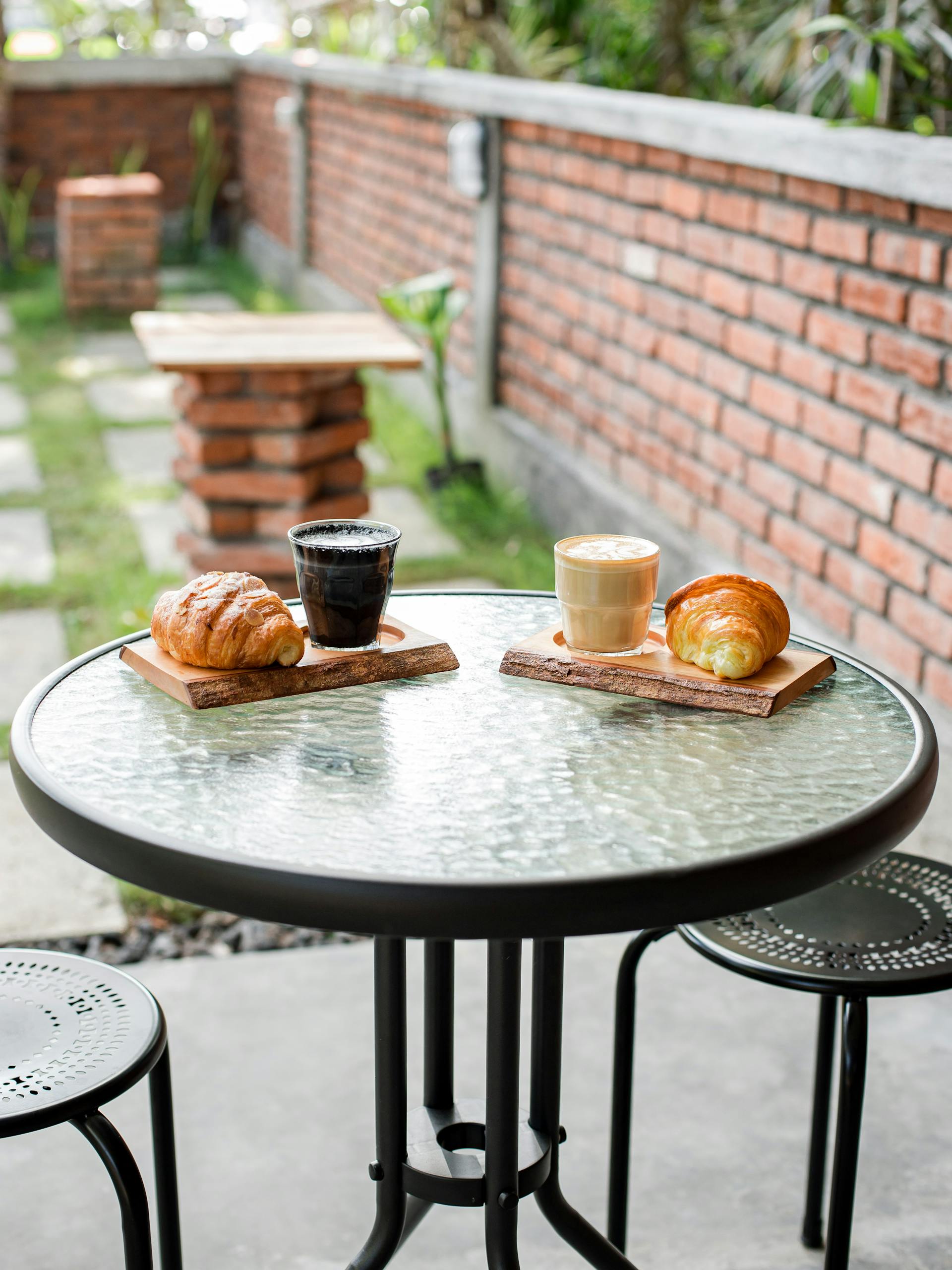 Coffee cups and croissants lying on a table | Source: Pexels