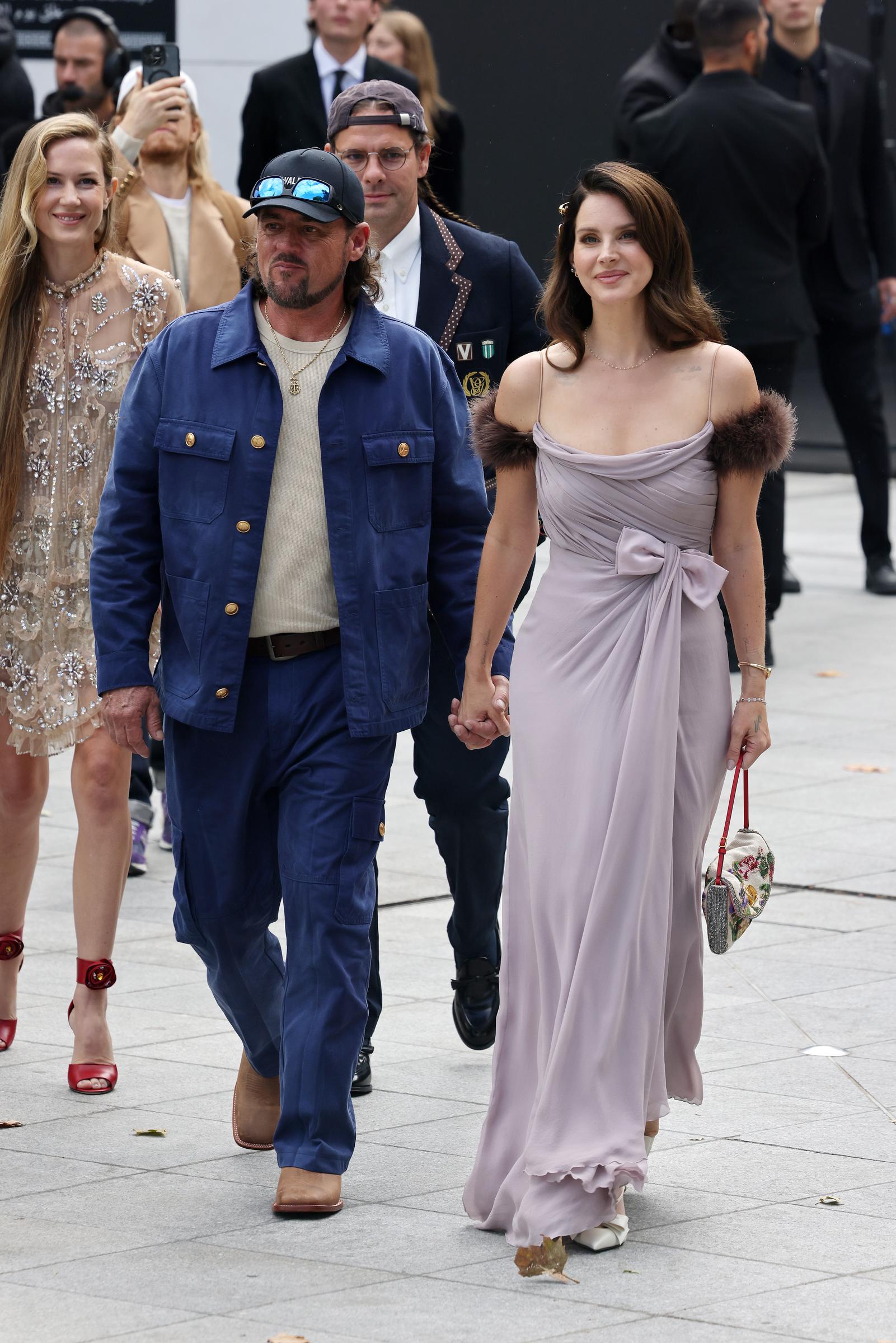Lana Del Rey and Jeremy Dufrene arrive for the Valentino show during the Womenswear Spring Summer 2026 as part of Paris Fashion Week on October 5, 2025, in Paris, France. | Source: Getty Images
