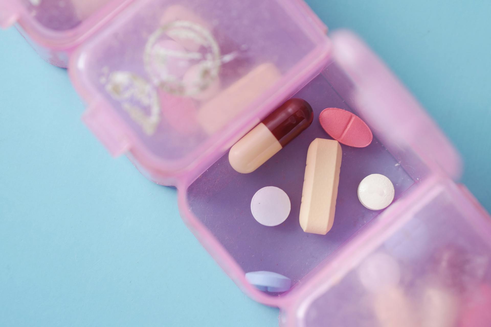Pills in a pill organizer | Source: Pexels