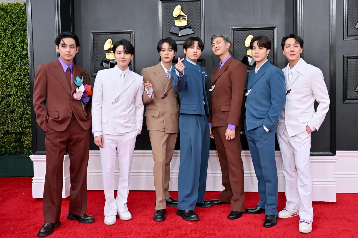 V, Suga, Jin, Jungkook, RM, Jimin and J-Hope of BTS attends the 64th Annual GRAMMY Awards at MGM Grand Garden Arena on April 03, 2022 in Las Vegas, Nevada. | Source: Getty Images