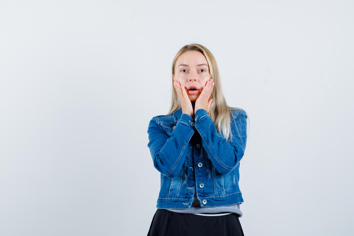 A shocked woman | Source: Freepik