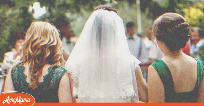 A bride with her bridesmaids | Source: Shutterstock