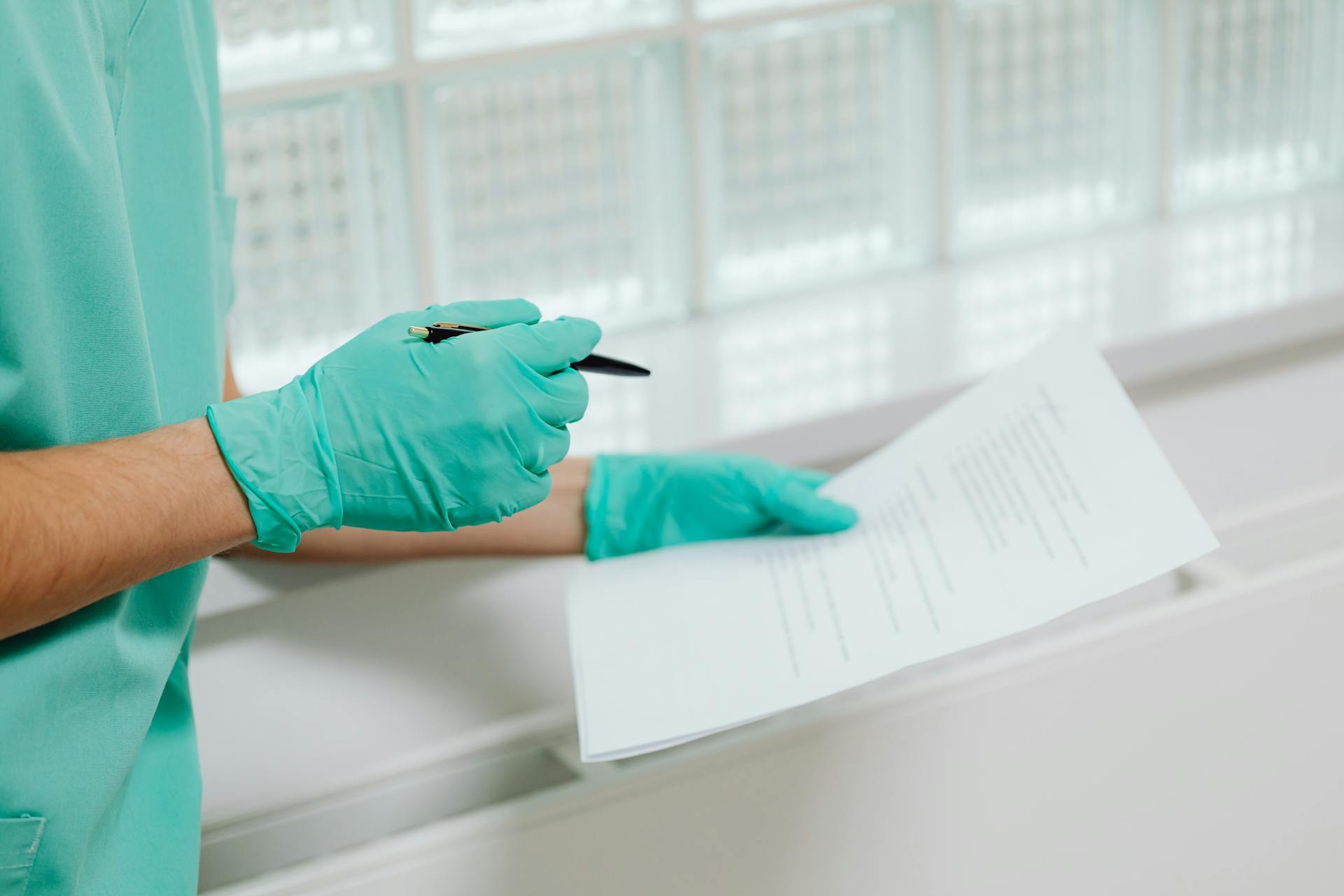 A doctor looking at a report | Source: Pexels