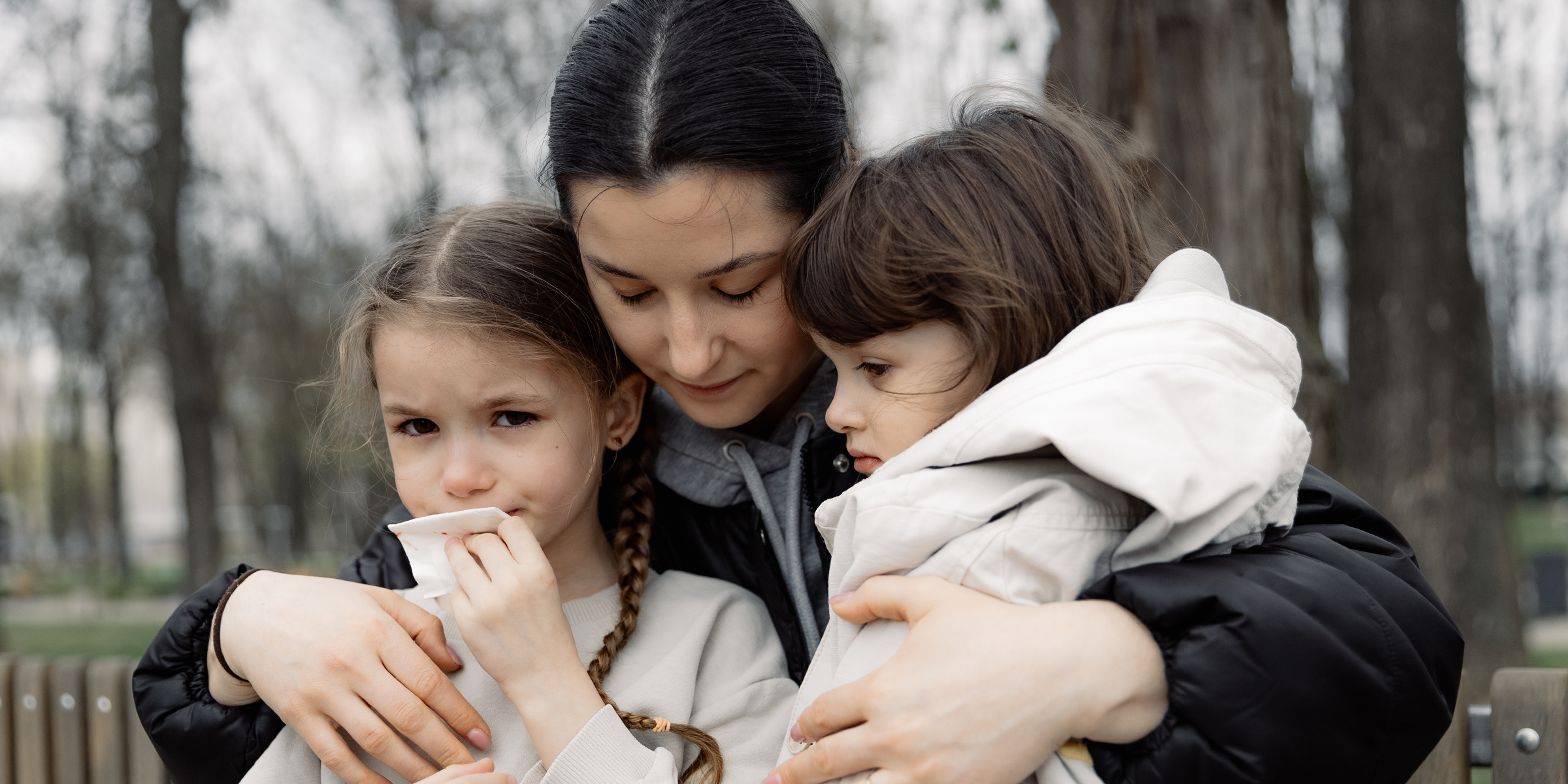 A woman and two girls | Source: Shutterstock