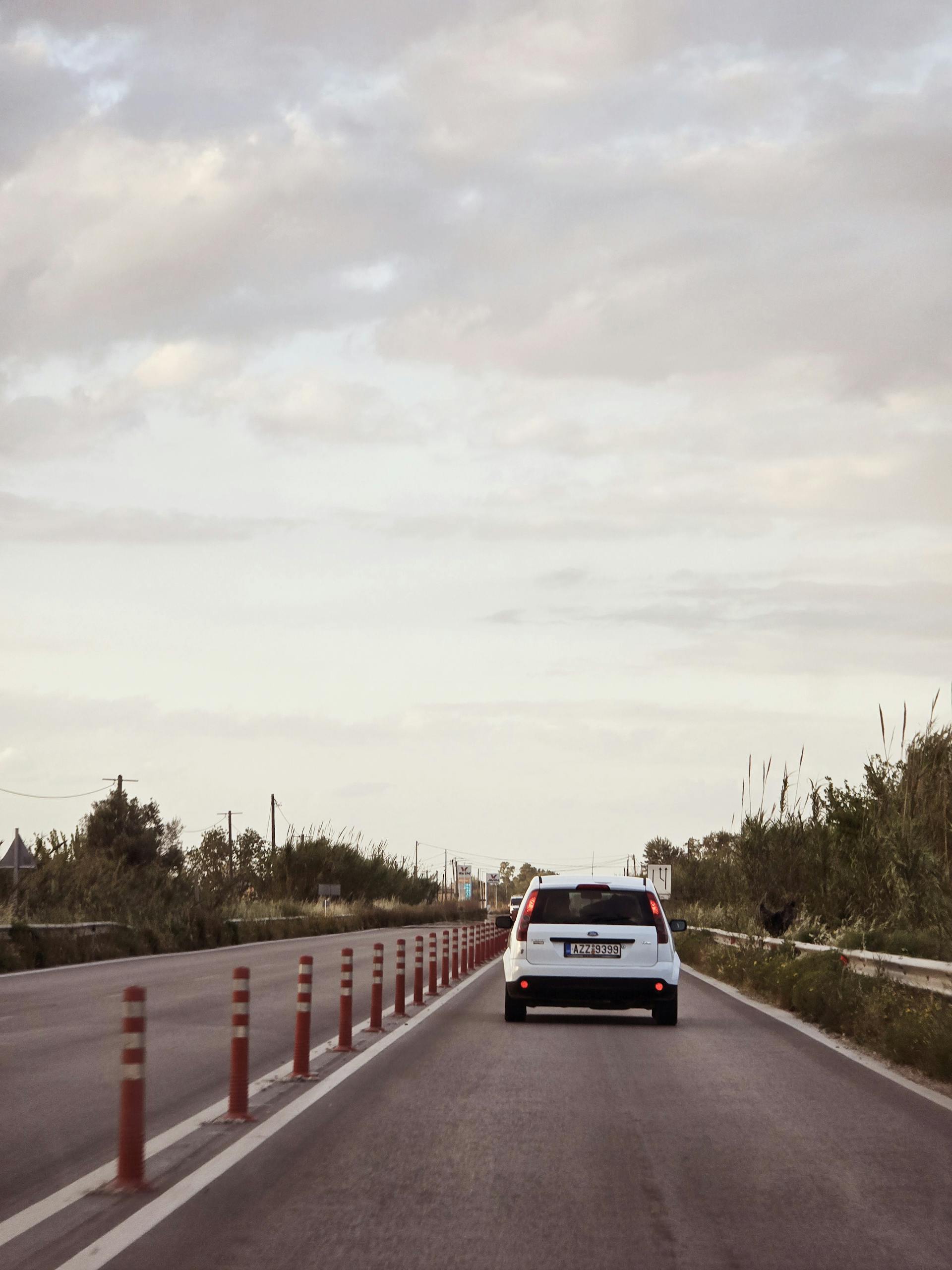 A car driving on a road | Source: Pexels