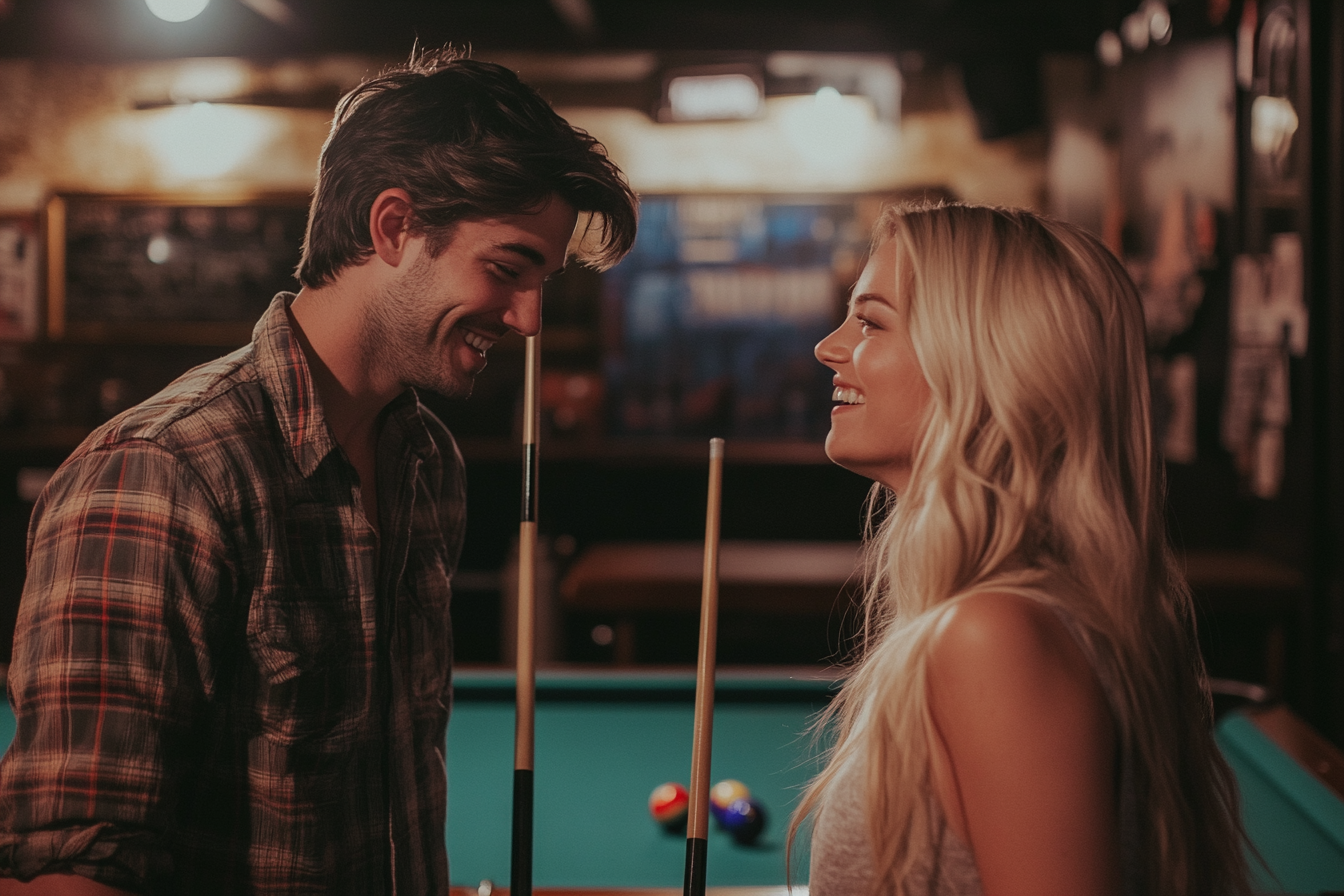 Two people standing beside a pool table | Source: Midjourney