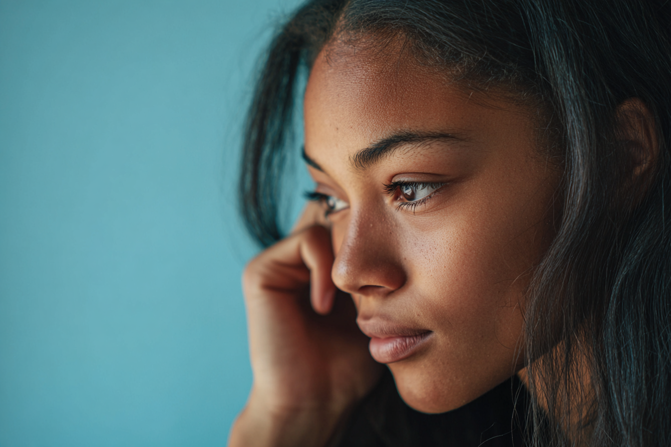 A thoughtful teen girl | Source: Midjourney