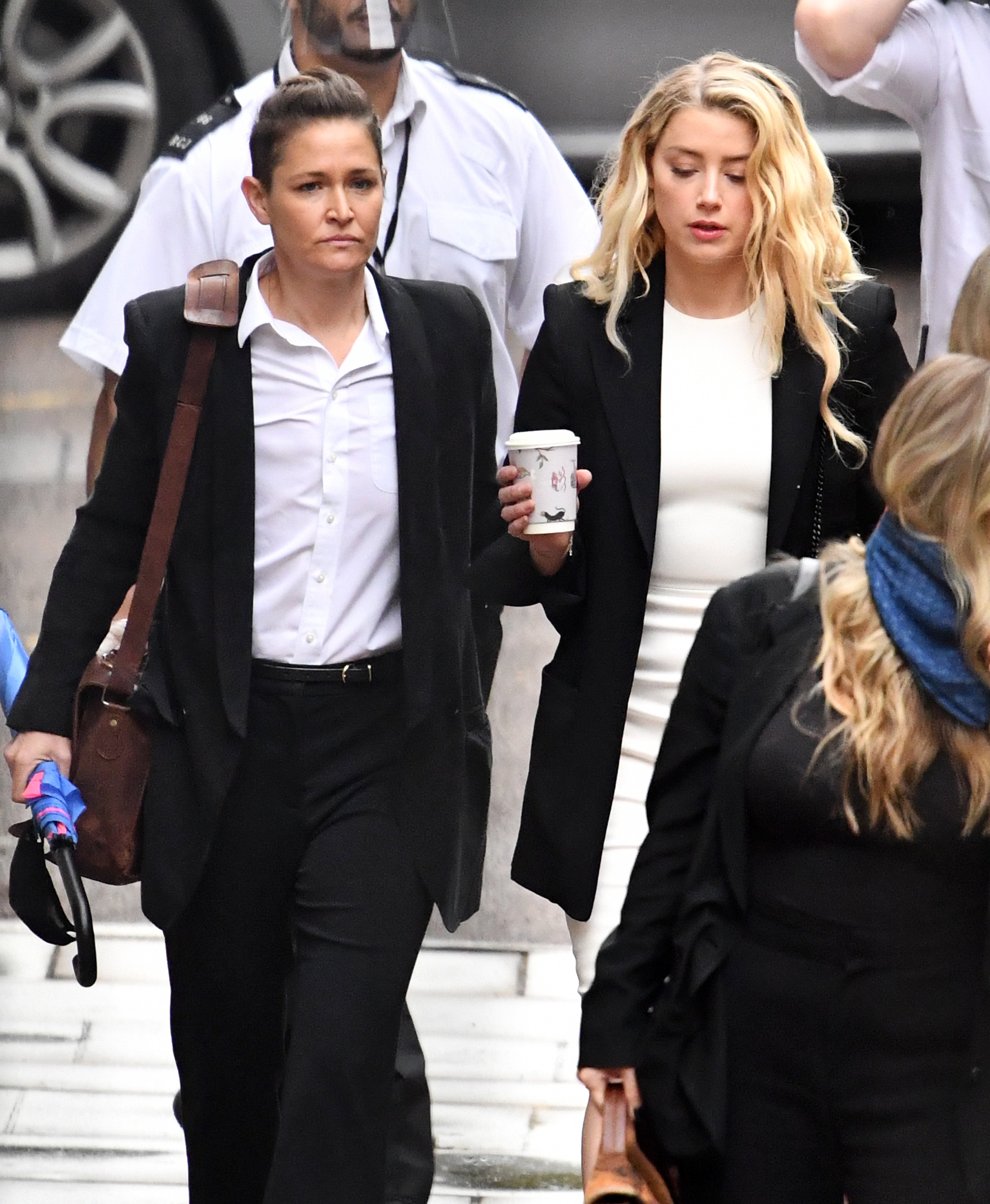 Bianca Butti with her ex-girlfriend, Amber Heard, arriving at the Royal Courts of Justice in London | Source: Getty Images