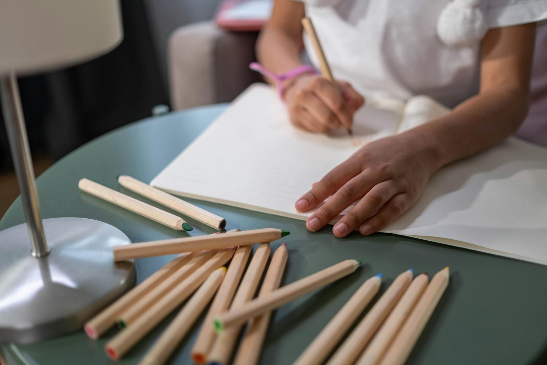 My Dad Invited My Brother and Me to His Wedding to the Woman He Cheated on Our Mom With – He Had No Idea He'd Regret It Soon 2 A child writing | Source: Pexels