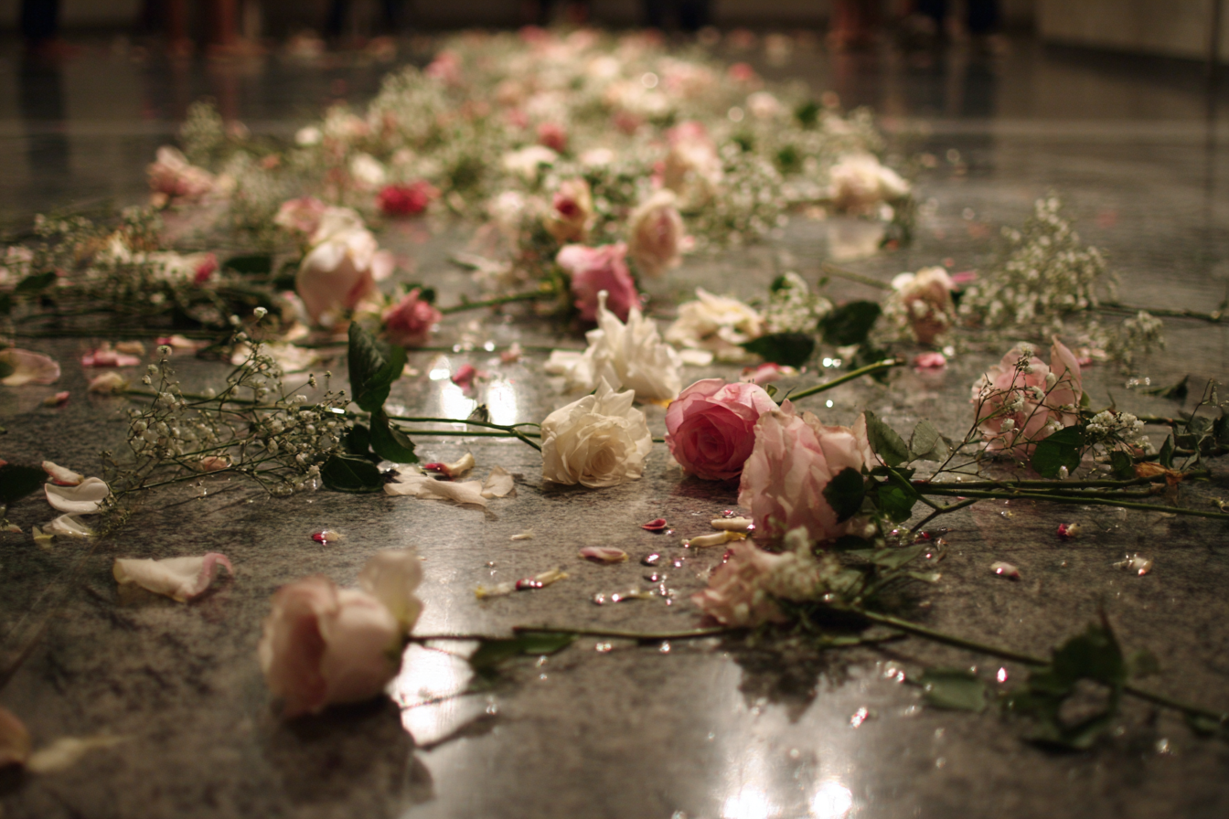 Flowers scattered on the floor | Source: Midjourney