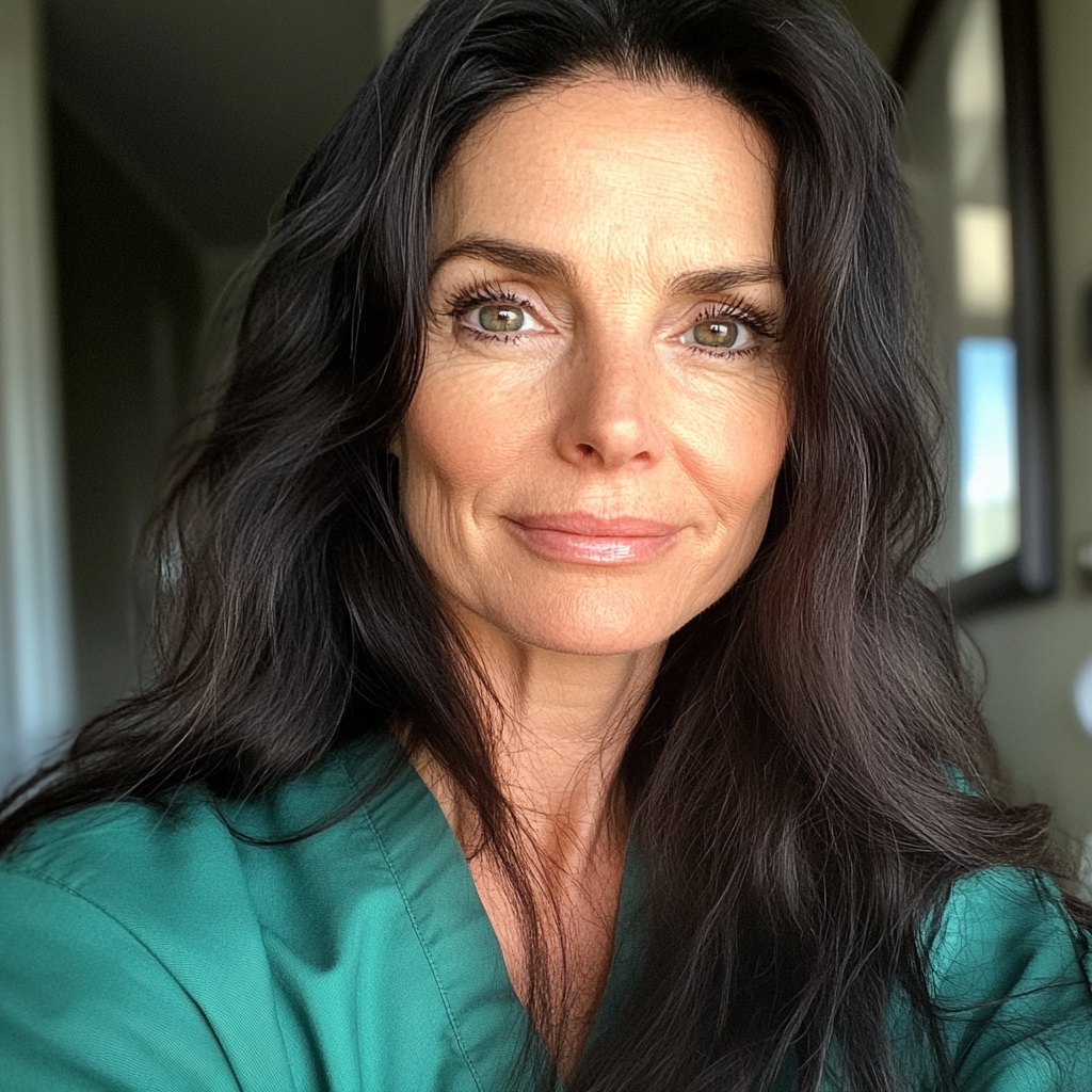 A close up of a woman wearing green scrubs | Source: Midjourney