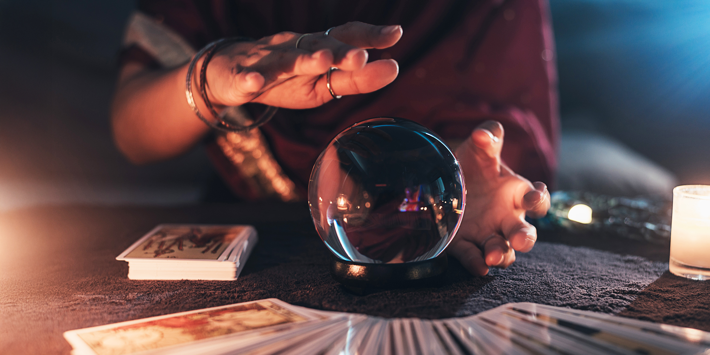 A fortune-teller using a crystal ball | Source: Shutterstock