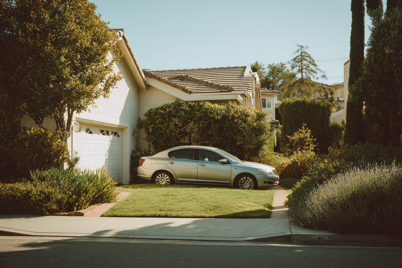 A car parked in a driveway | Source: Midjourney