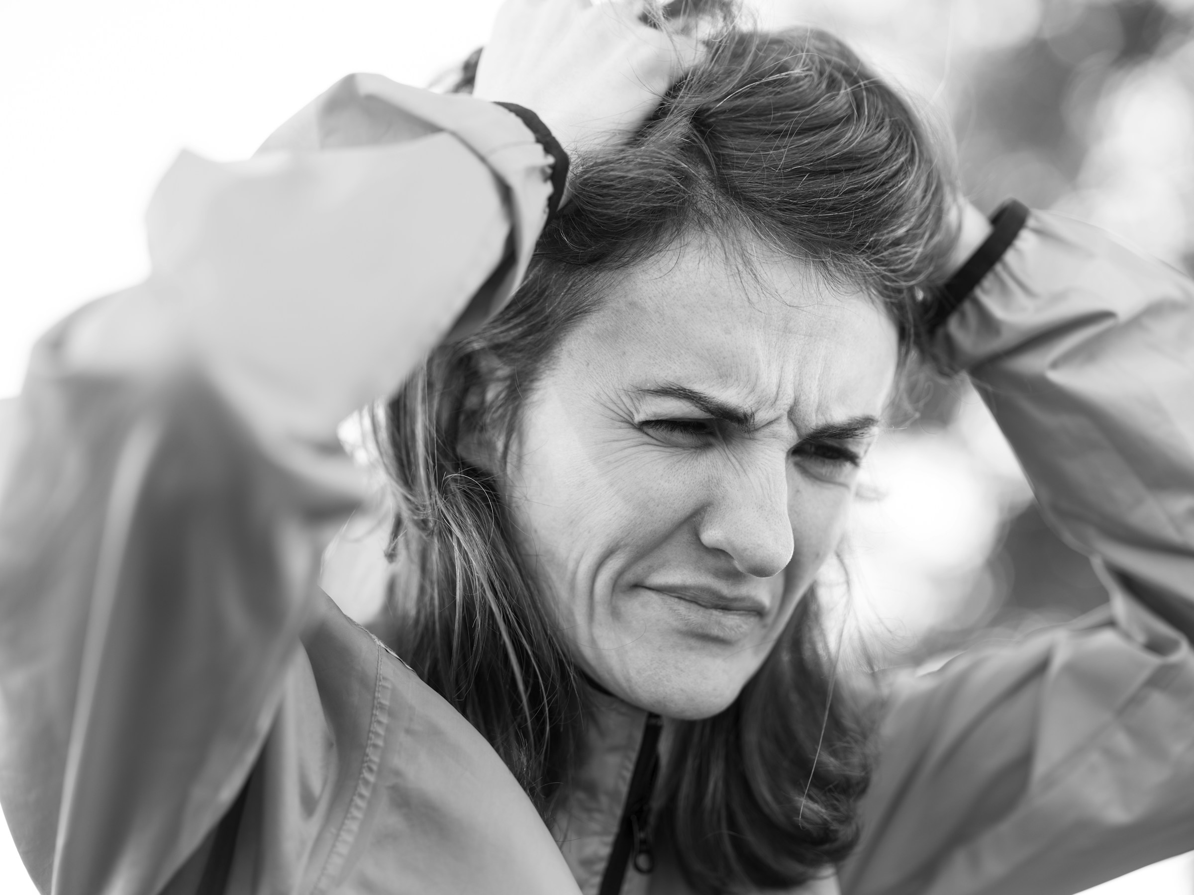A grayscale photo of a distraught woman | Source: Unsplash
