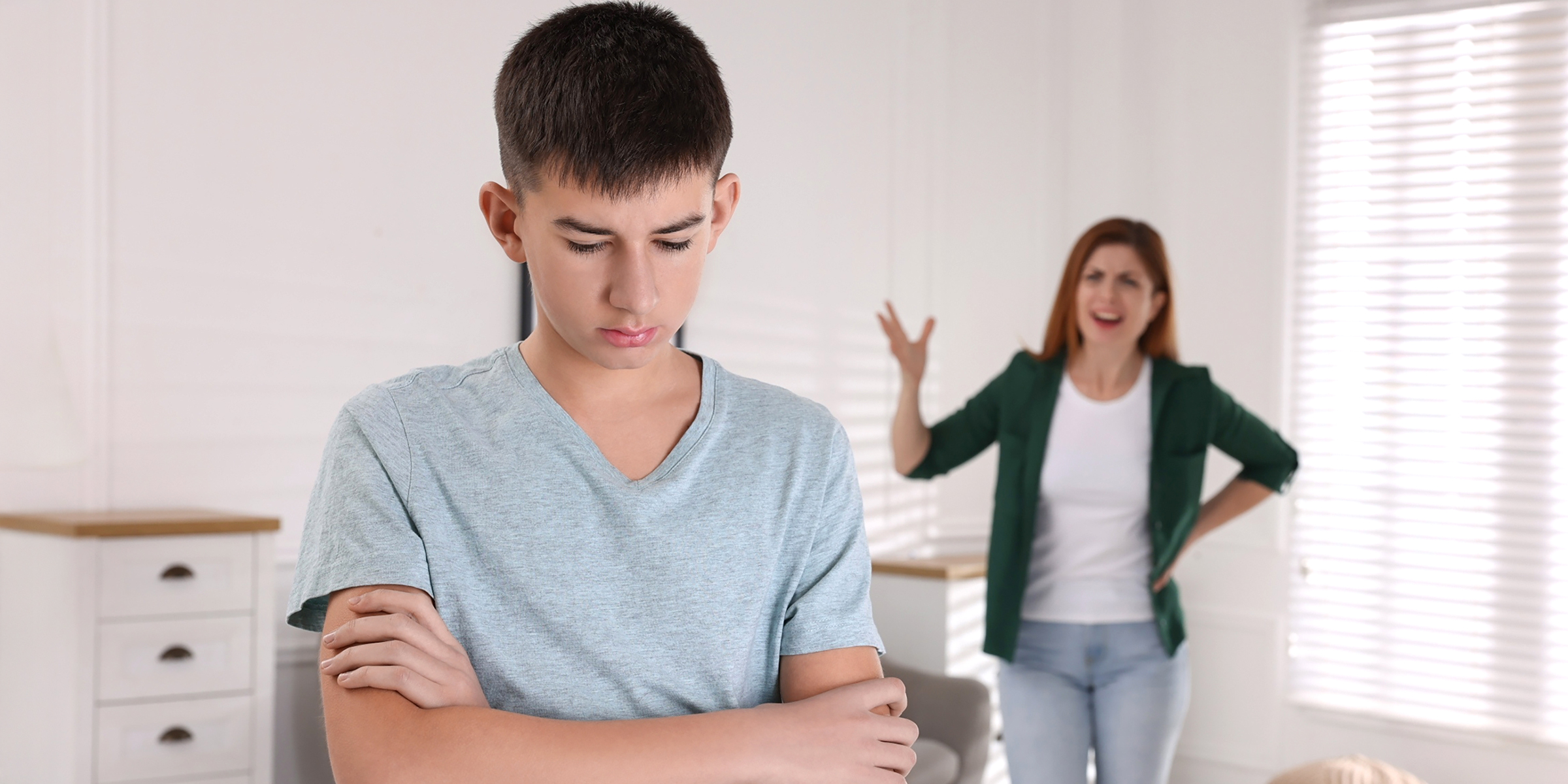 A mother scolding her boy | Source: Shutterstock