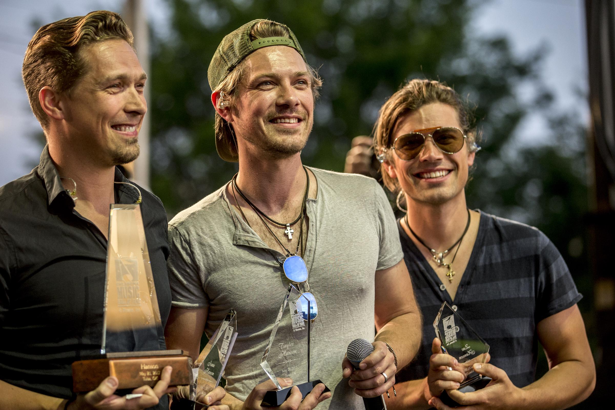 The band members pictured at their festival on May 21, 2017, in Tulsa, Oklahoma. | Source: Getty Images