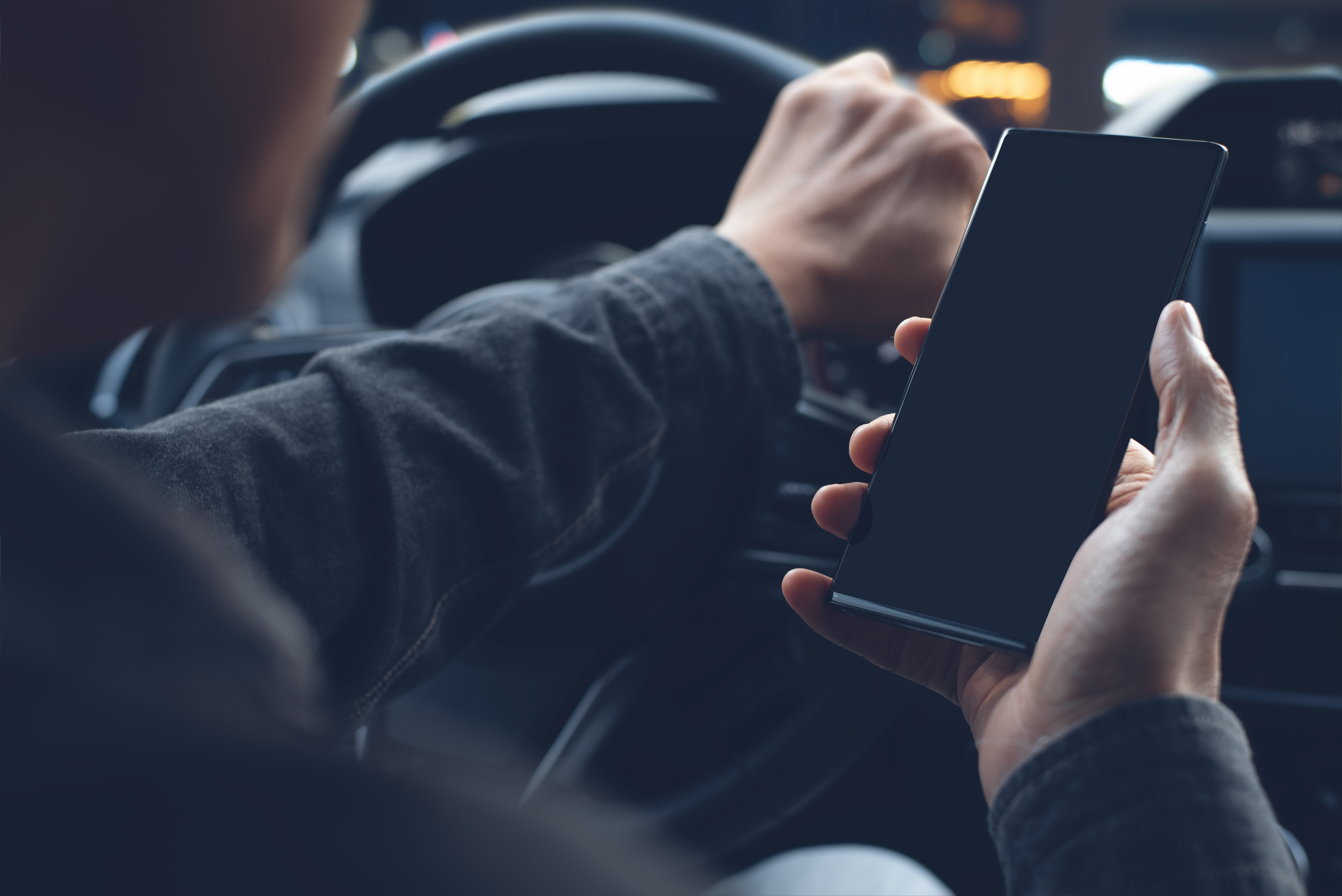 Phone in hand | Source: Shutterstock