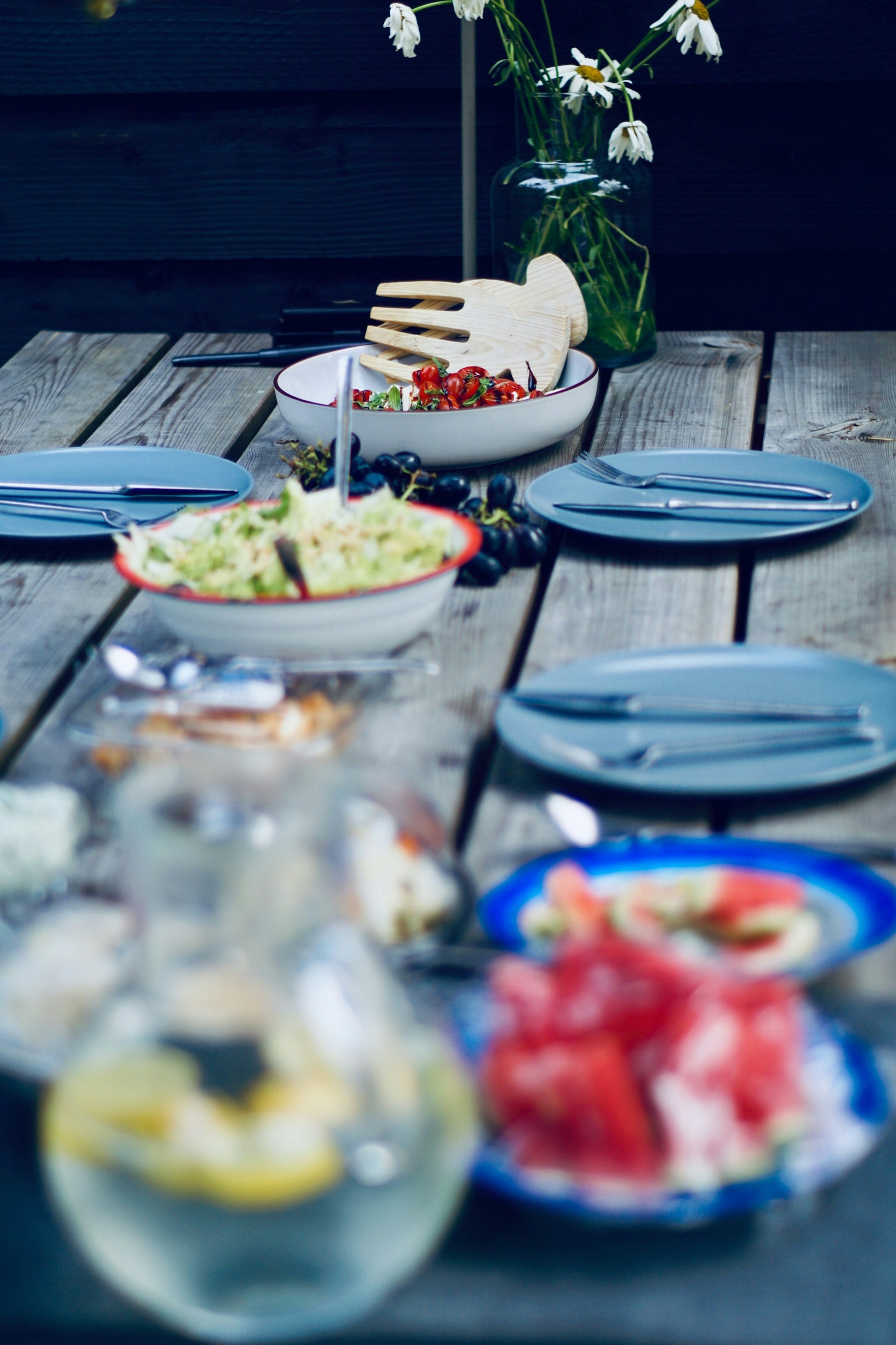 Plates and food on a table | Source: Unsplash