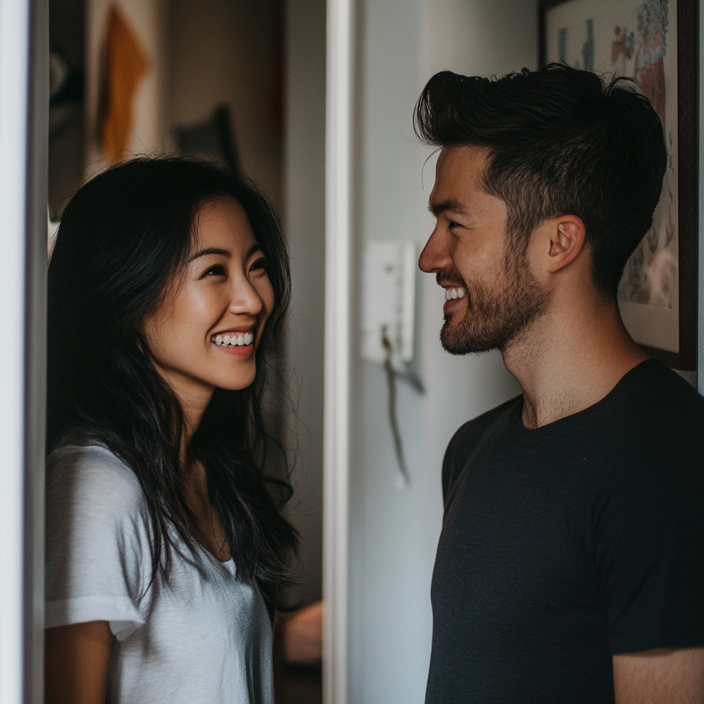 A happy couple standing in the doorway | Source: Midjourney