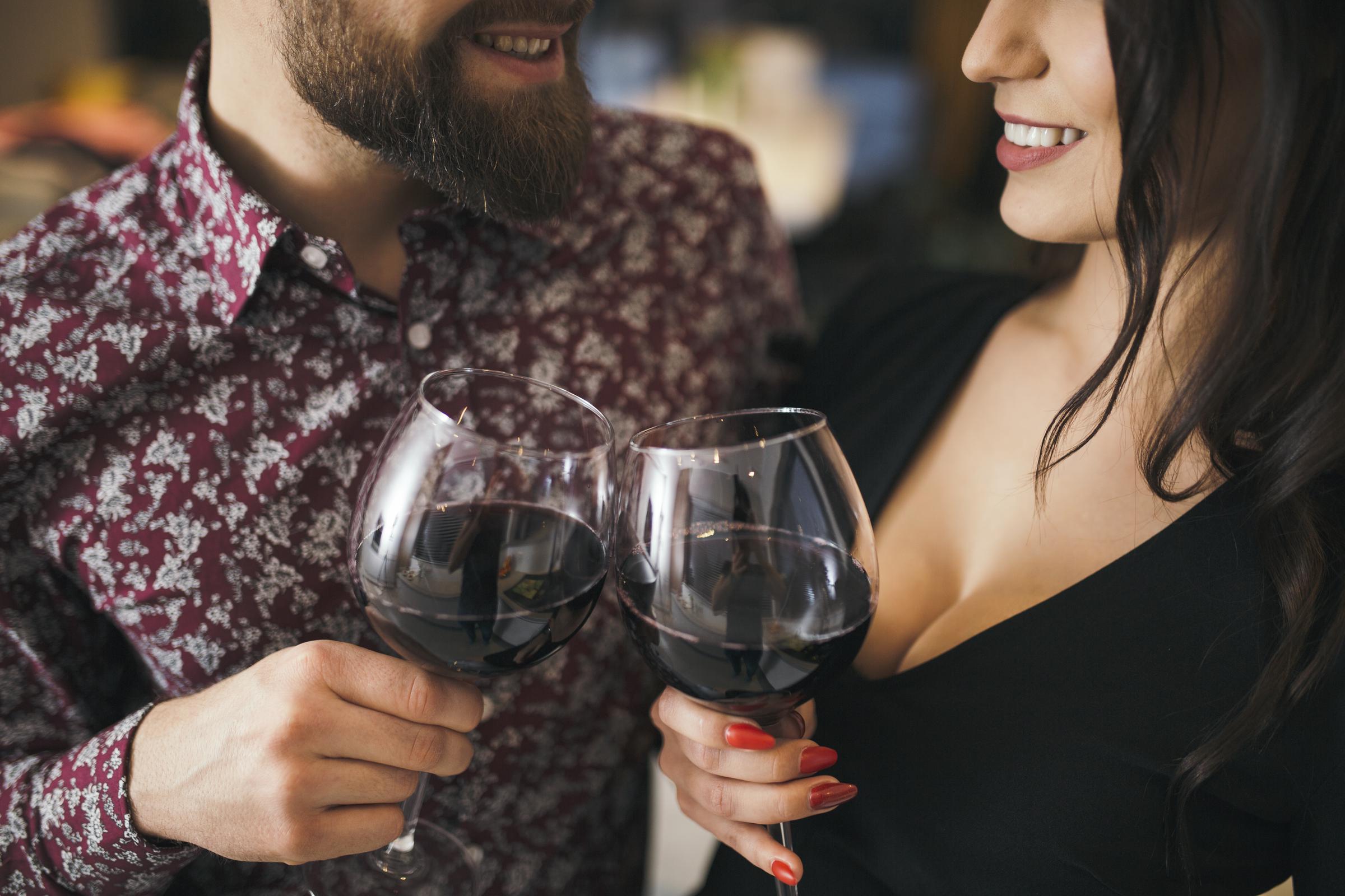 Two people enjoying wine | Source: Freepik