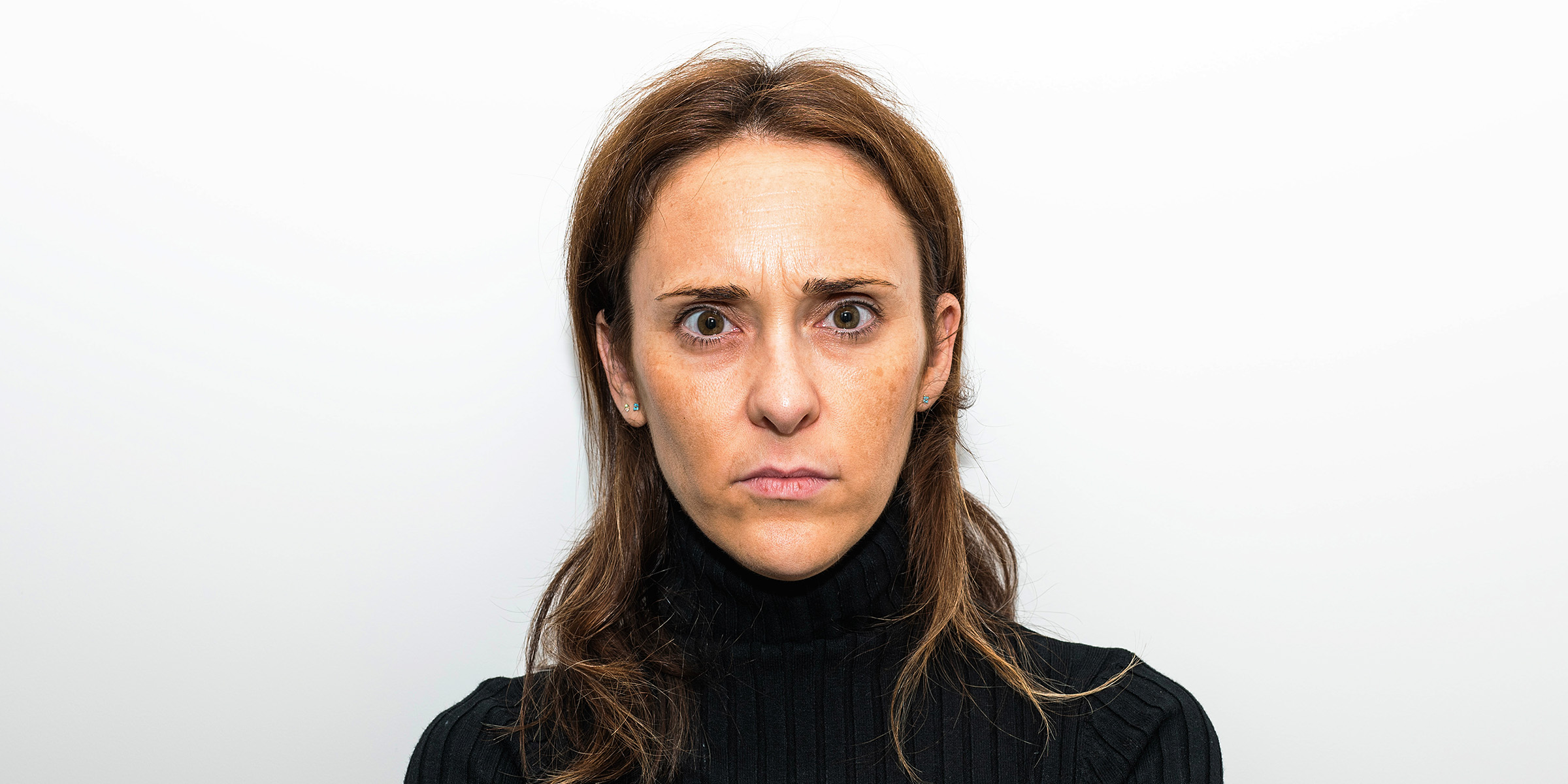 A woman looking straight ahead | Source: Shutterstock