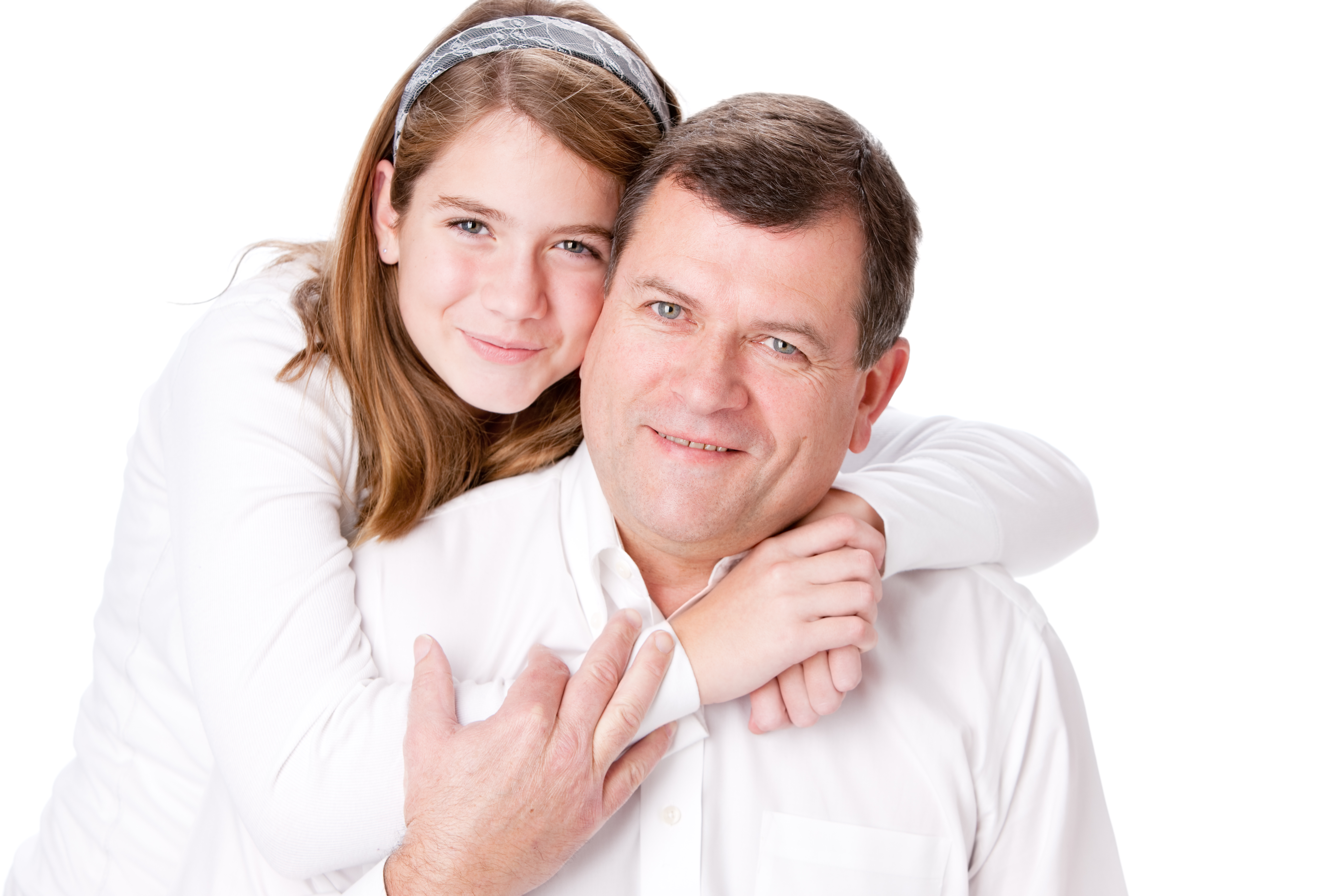 A man hugging his teenage daughter | Source: Getty Images